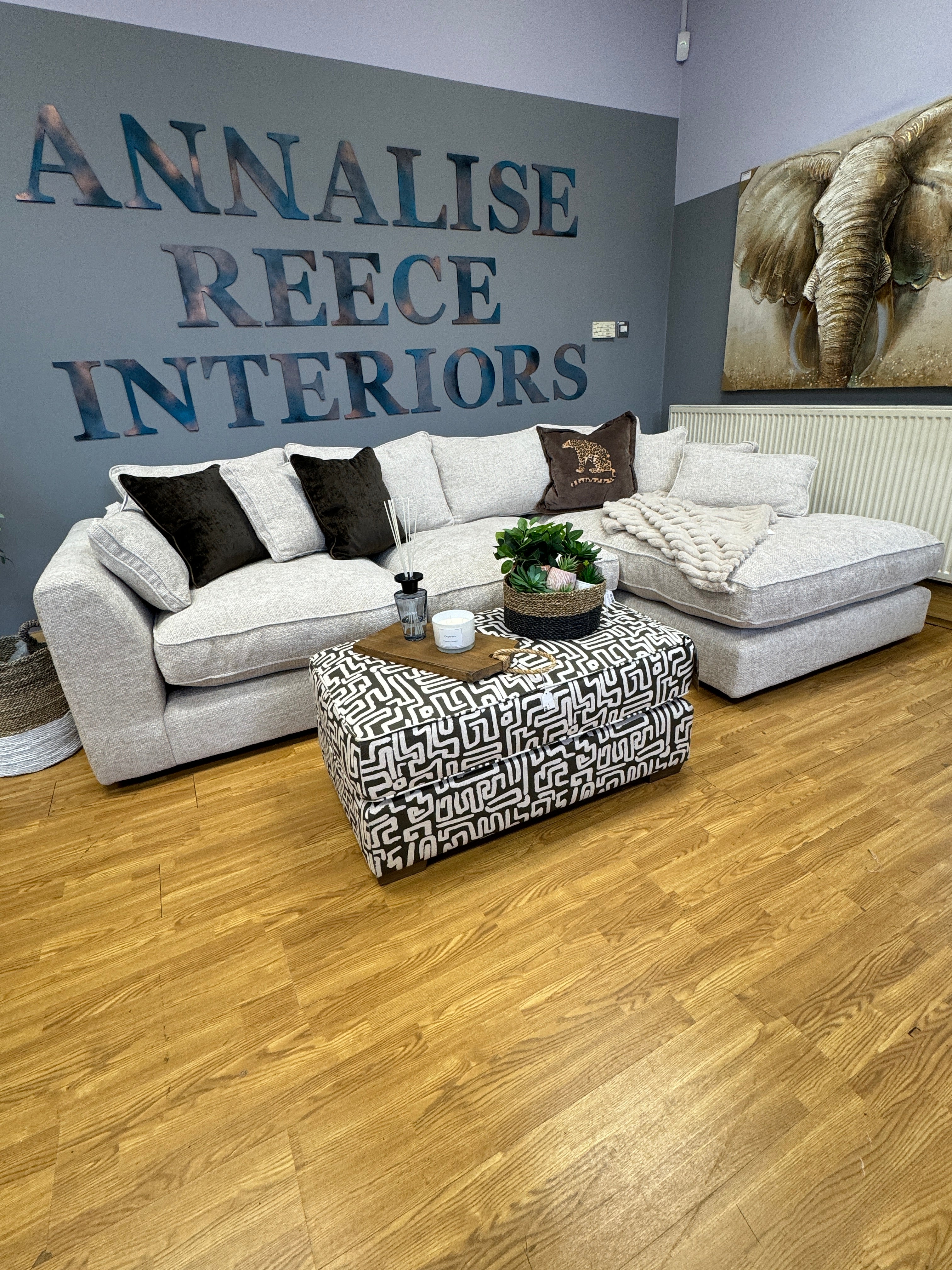 Jarvis padded top footstool in grey geo print fabric
