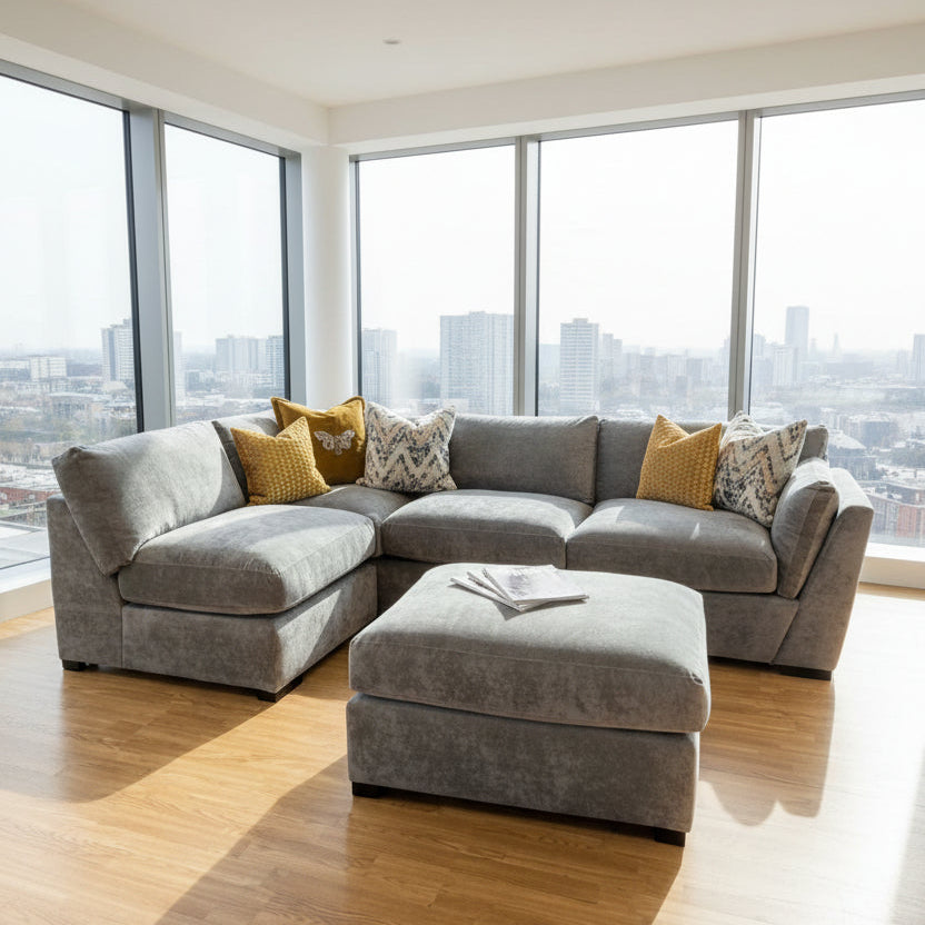 Phoenix left facing corner chaise sofa with footstool in Kingston Grey fabric