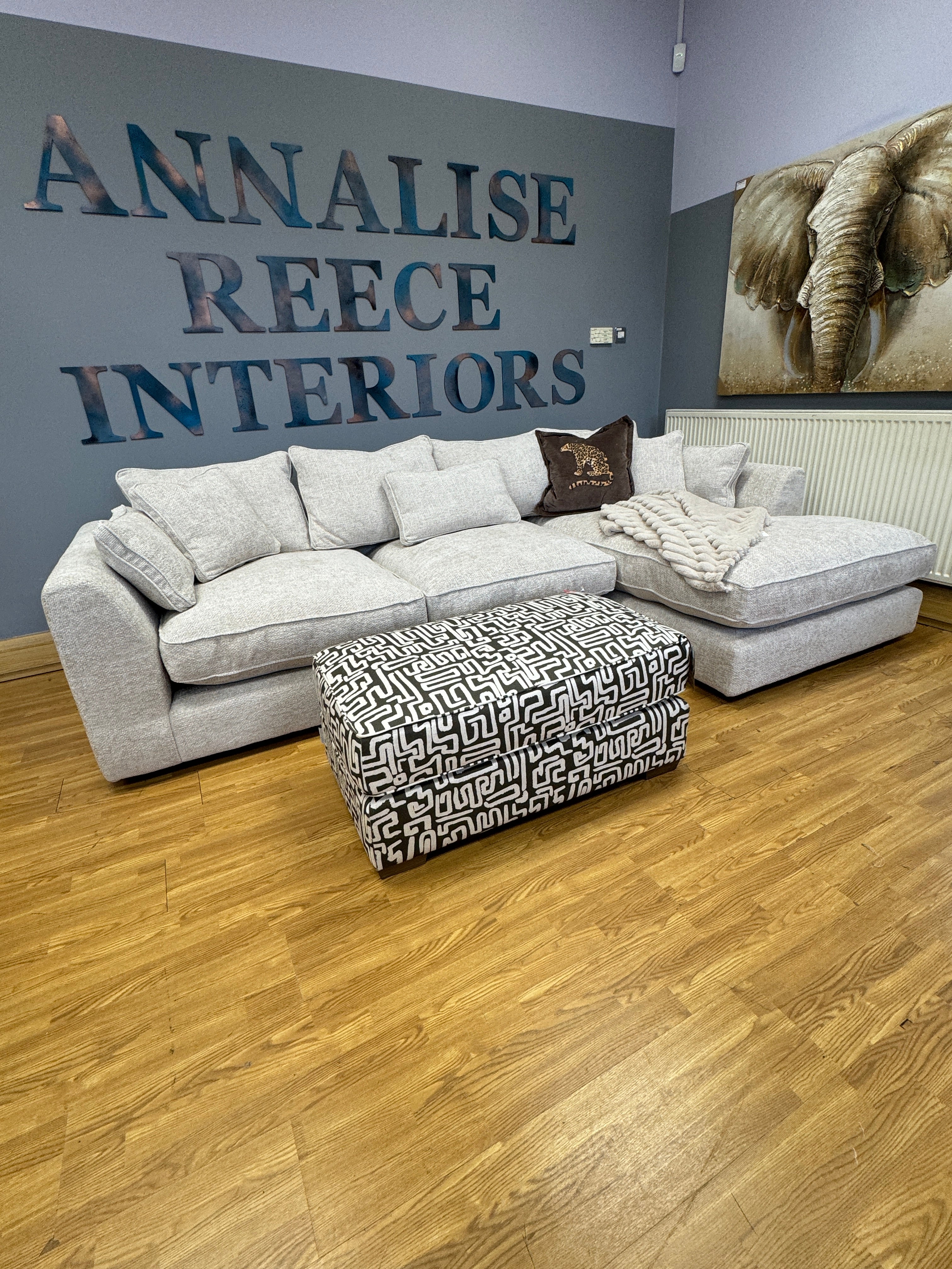 Jarvis padded top footstool in grey geo print fabric
