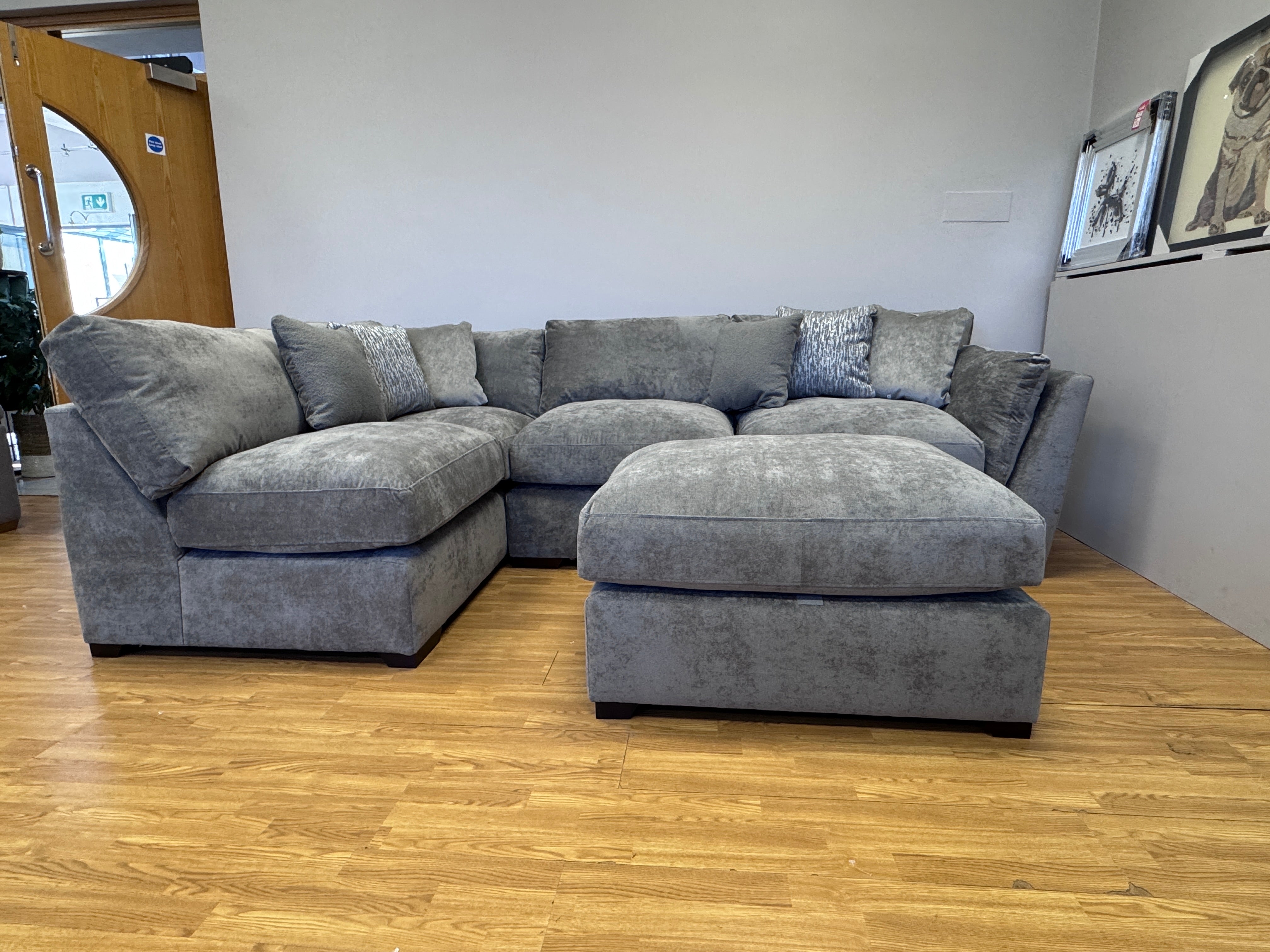 Phoenix left facing corner chaise sofa with footstool in Kingston Grey fabric
