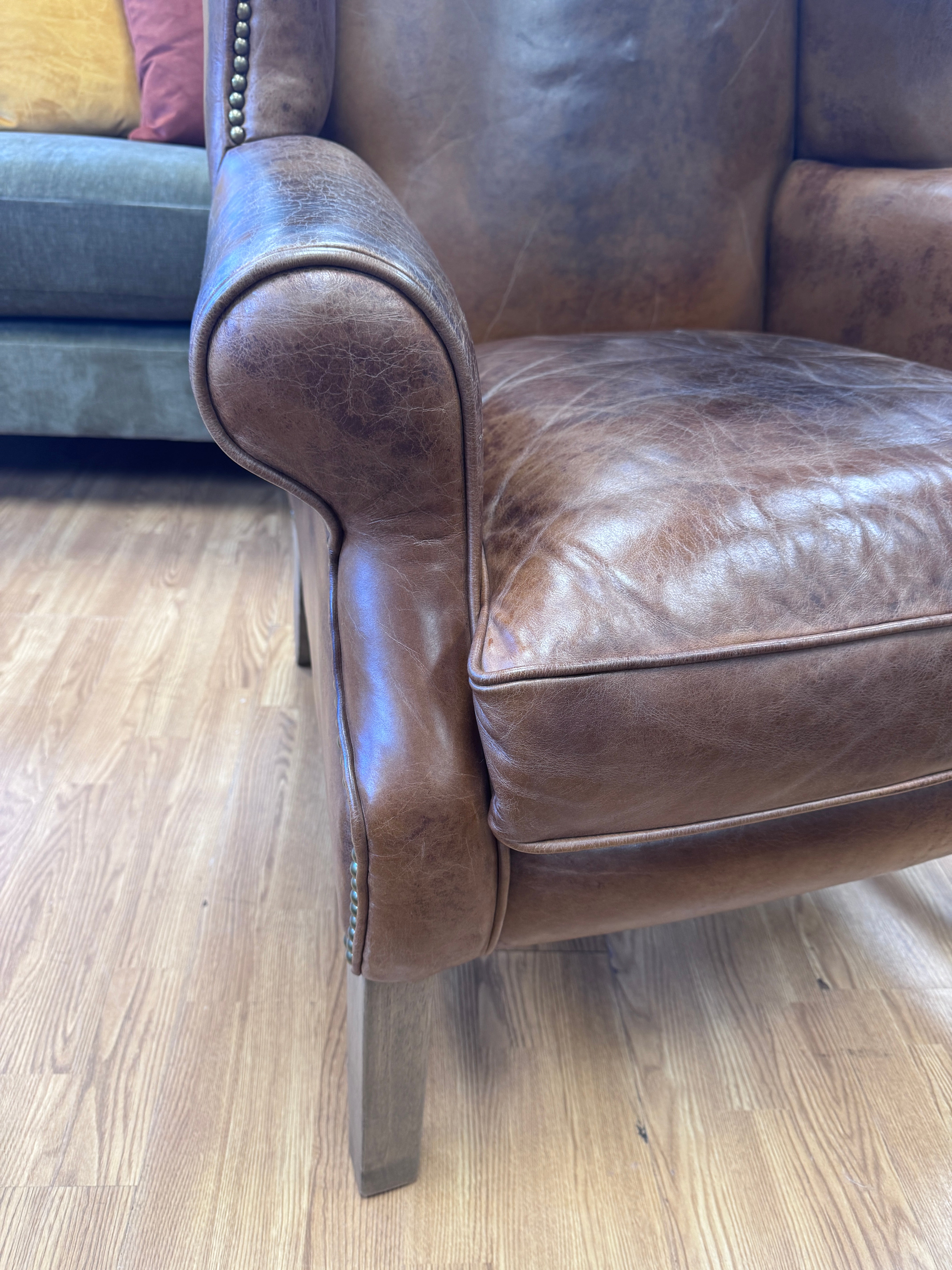 Halo wingback armchair in Cognac leather