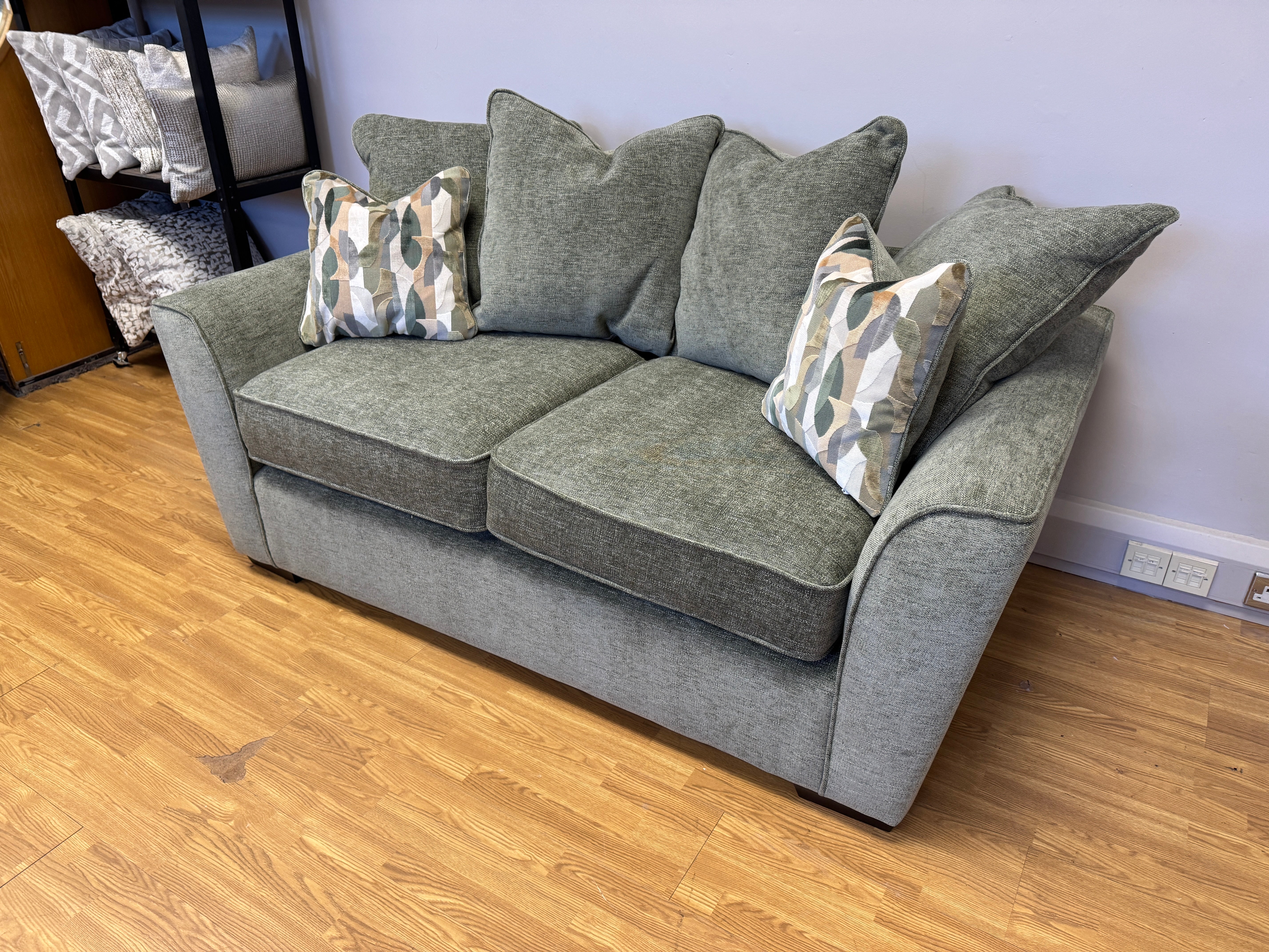 Caspian 2 seater cushion back sofa in Marlon Botanic green fabric