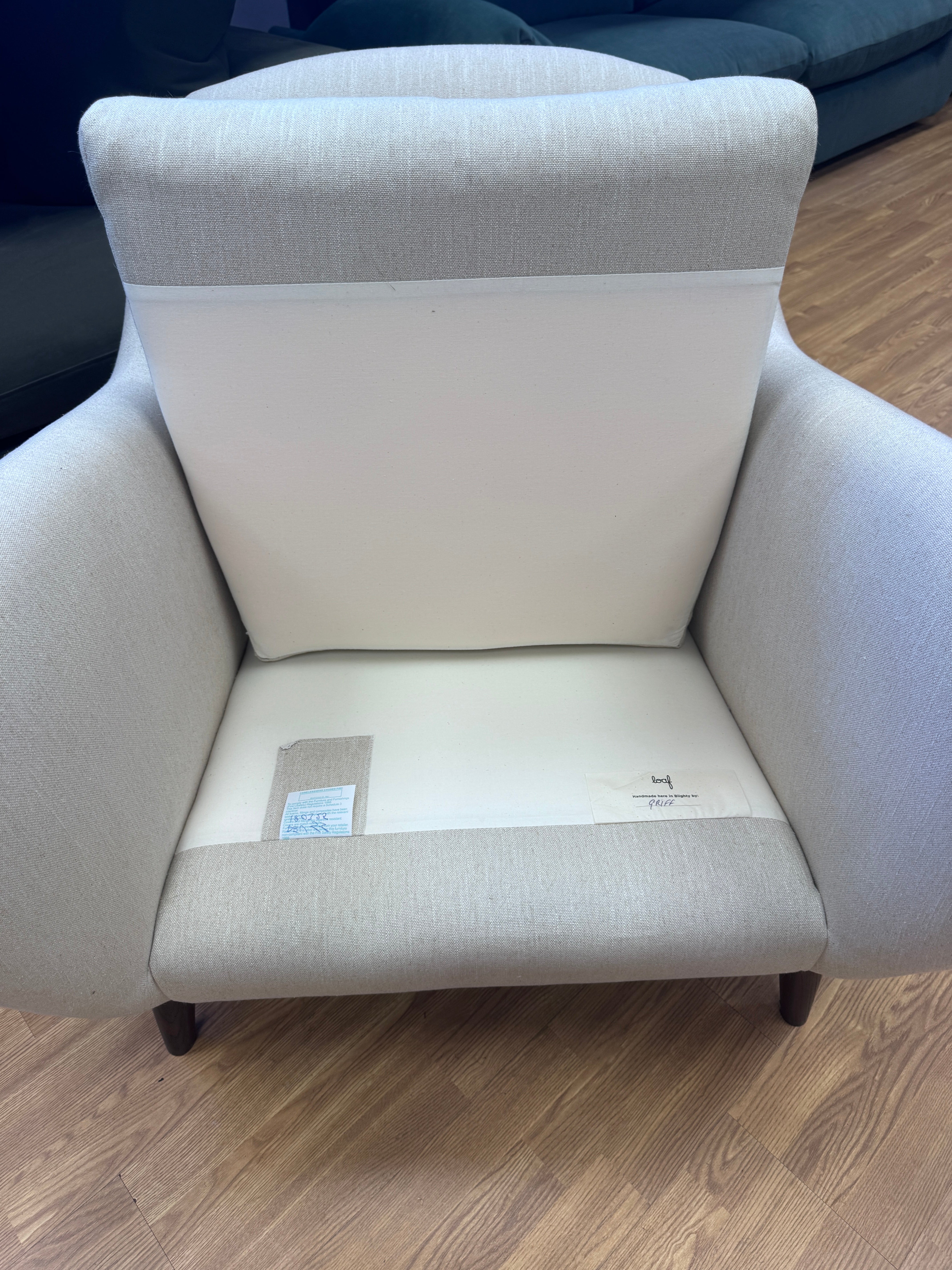 Sample fireside accent chair in Thatch house fabric