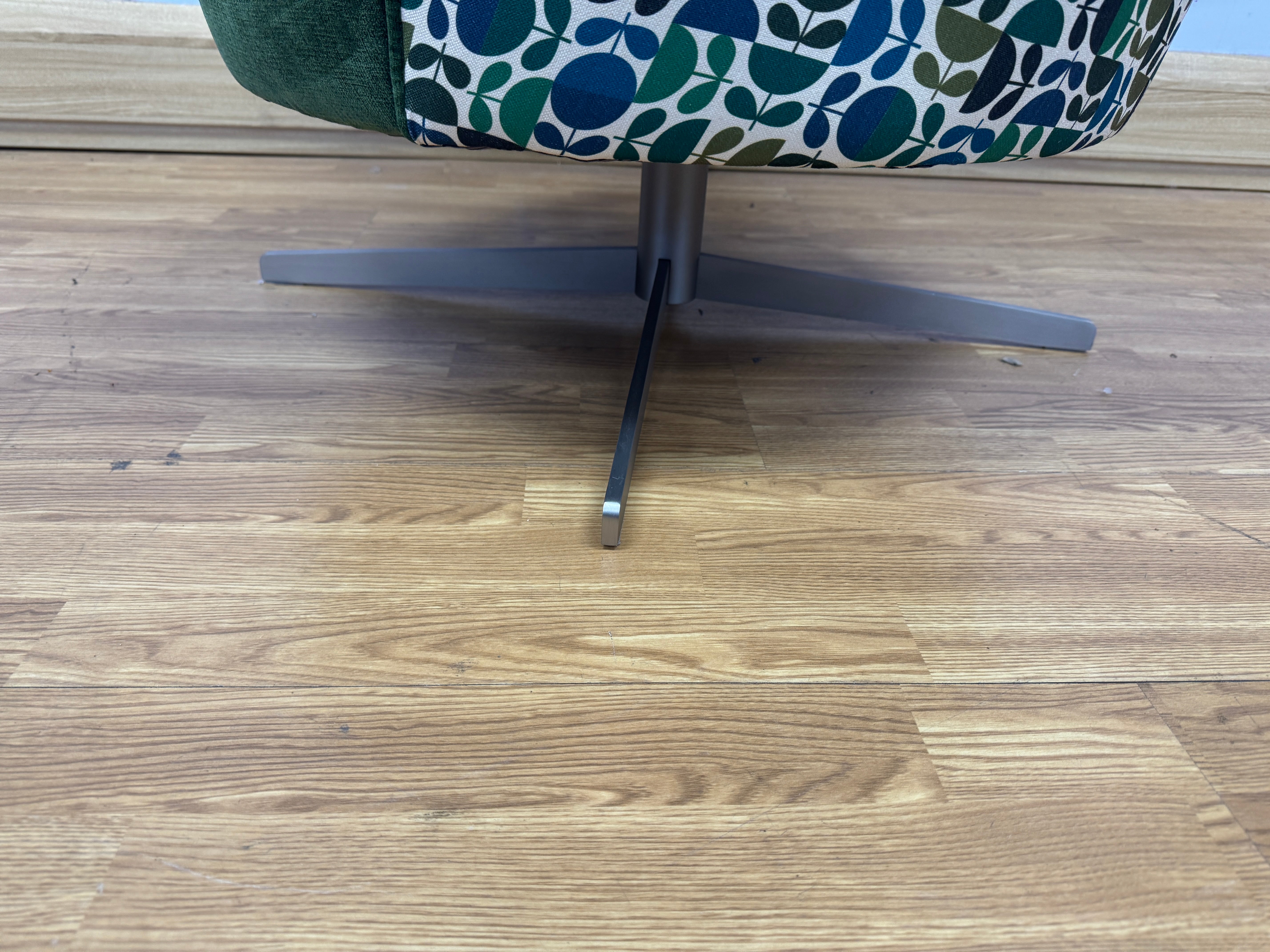 Orla Kiely Lily swivel base chair in Evergreen velvet with Jigsaw emerald navy back