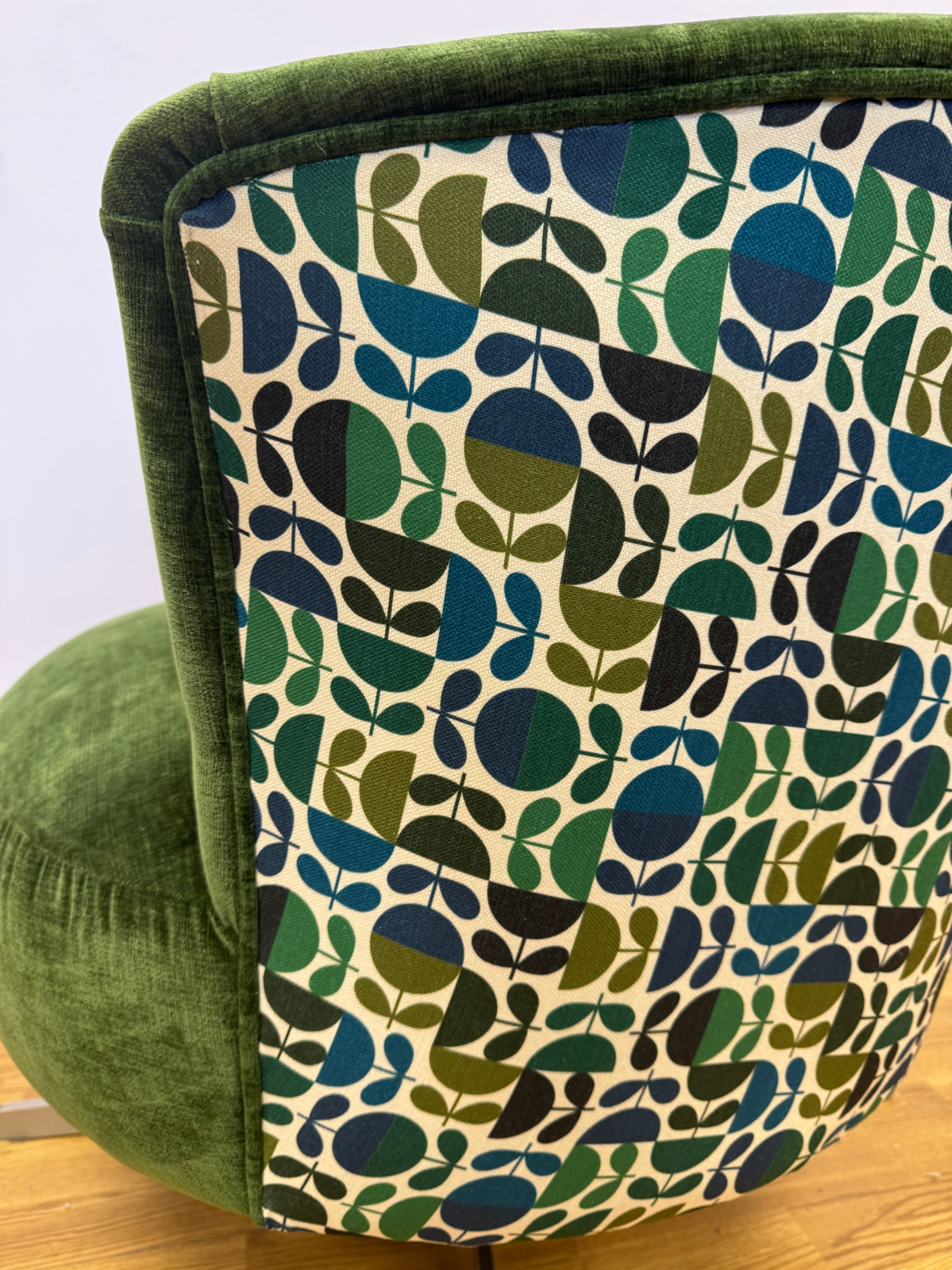 Orla Kiely Lily swivel base chair in Evergreen velvet with Jigsaw emerald navy back