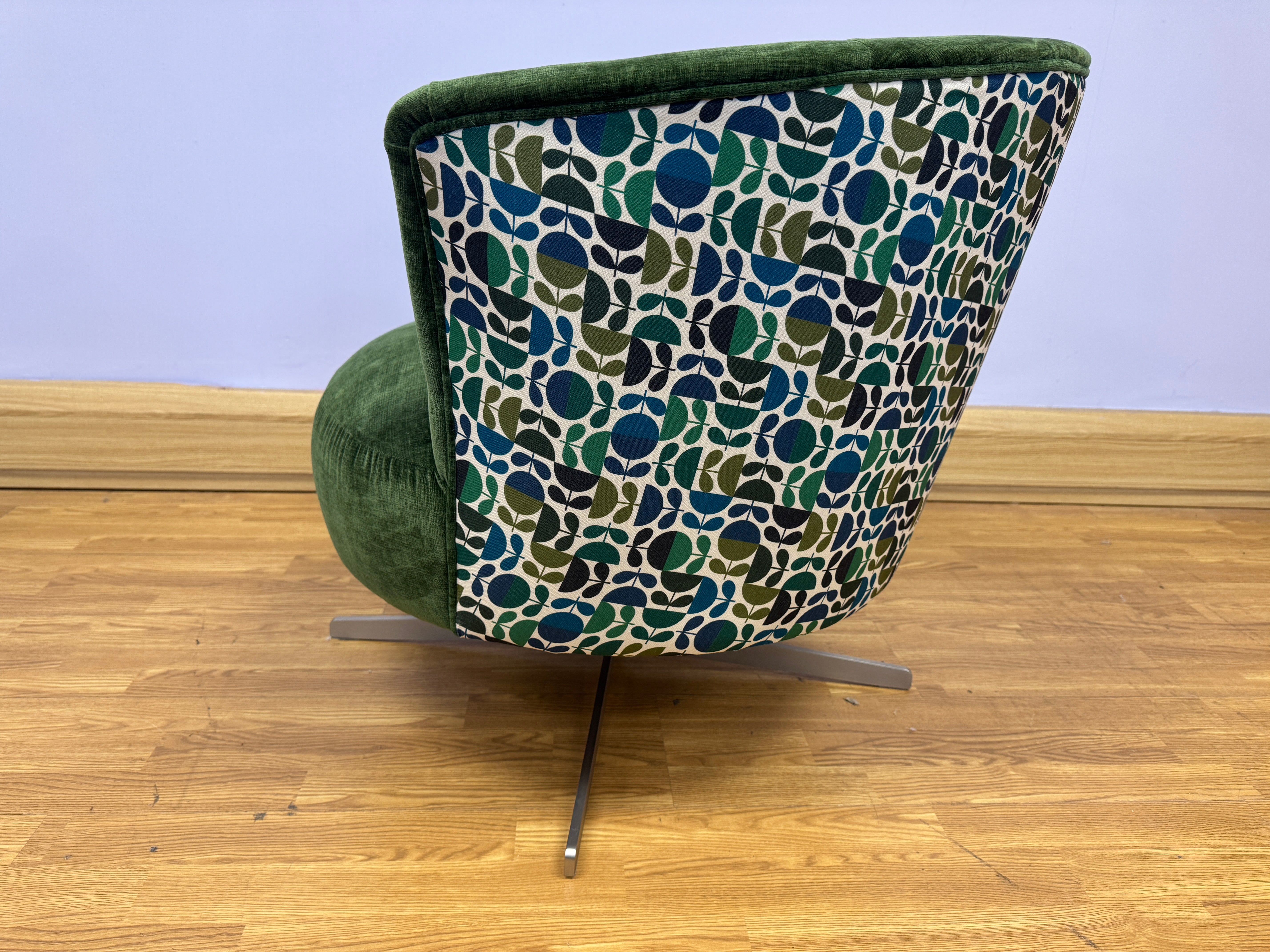 Orla Kiely Lily swivel base chair in Evergreen velvet with Jigsaw emerald navy back
