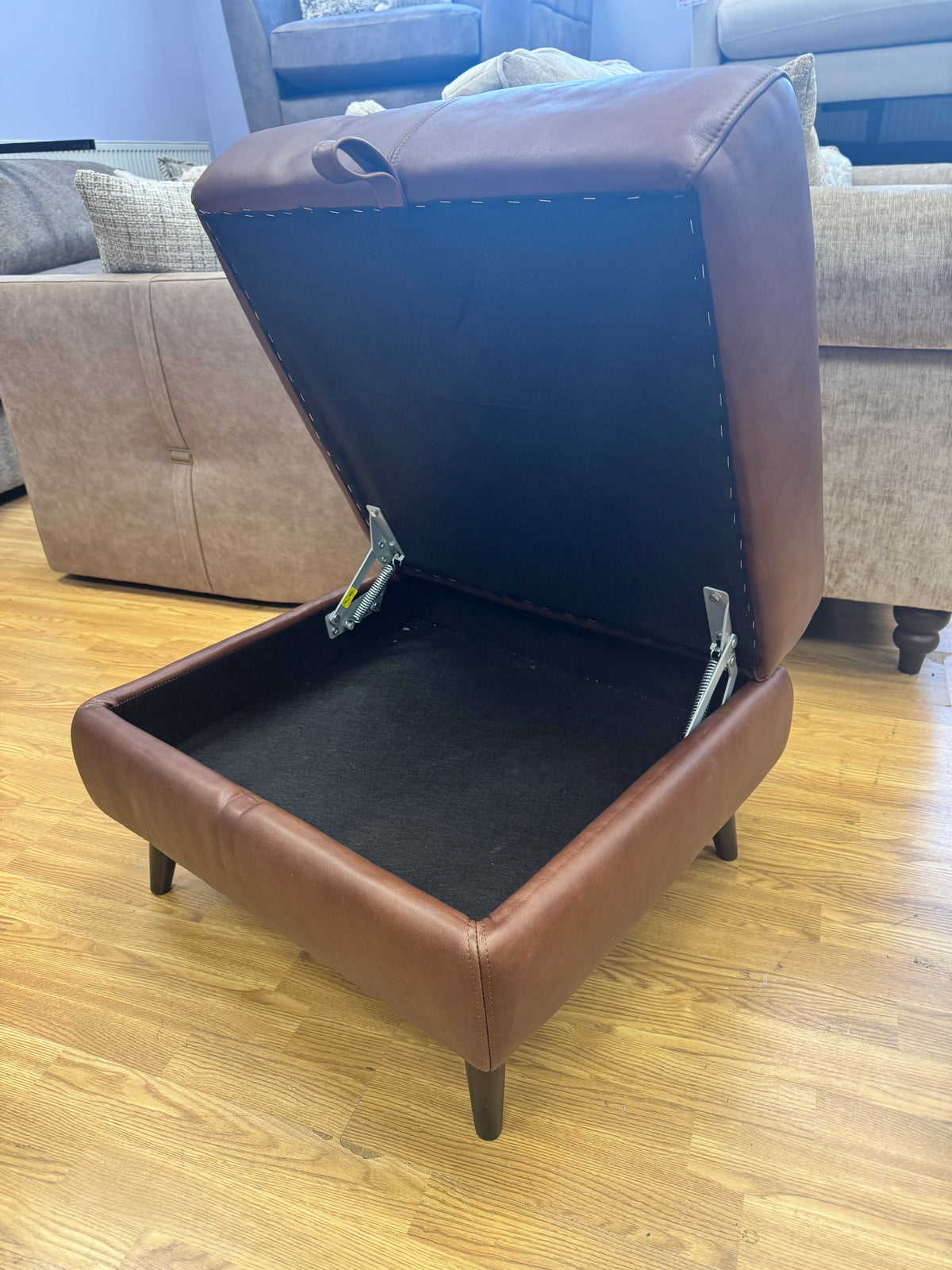 Adler storage footstool in soft tan brown leather