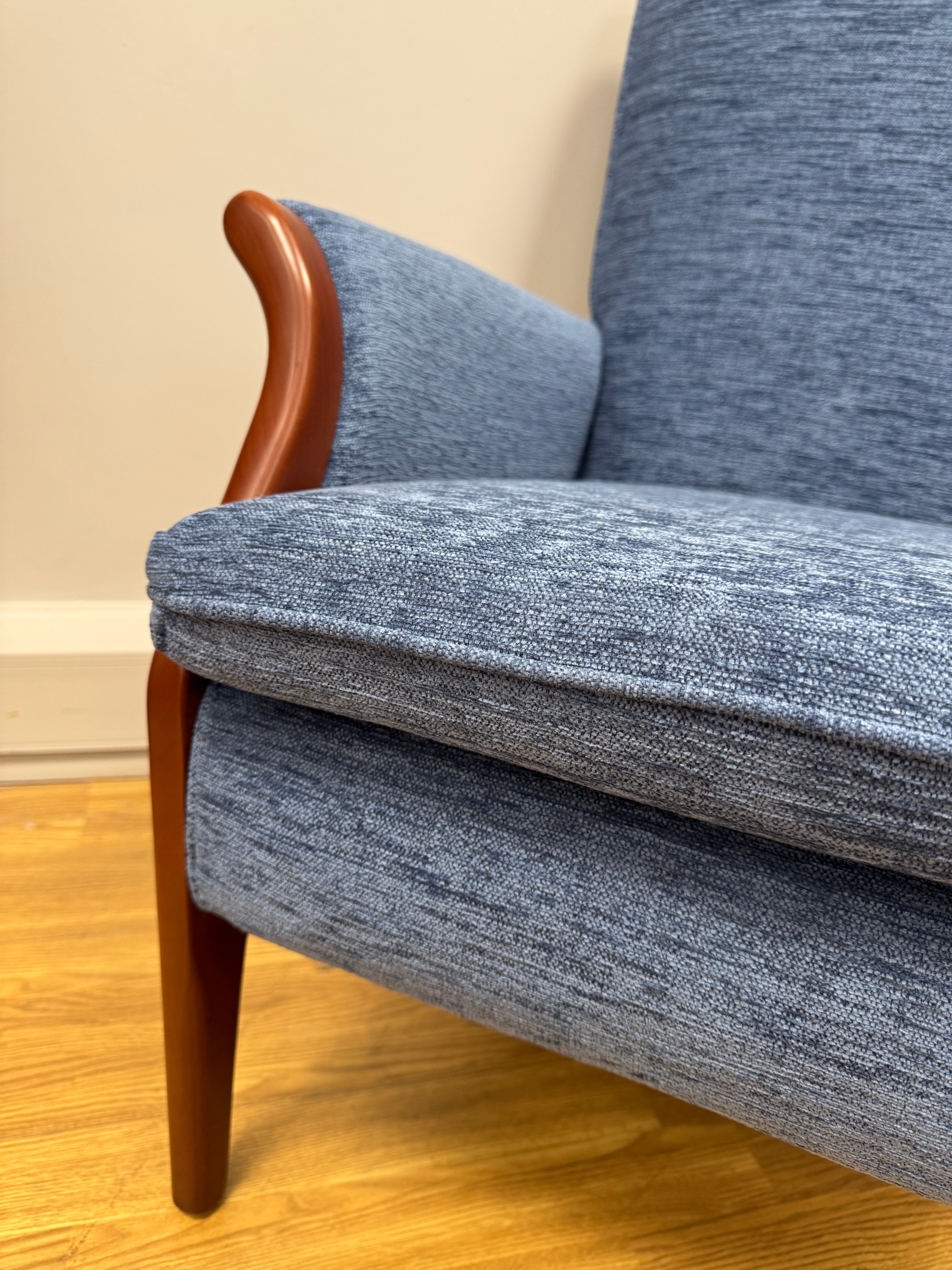 Parker Knoll Froxfield fireside chair in marine blue fabric with cherry wood frame