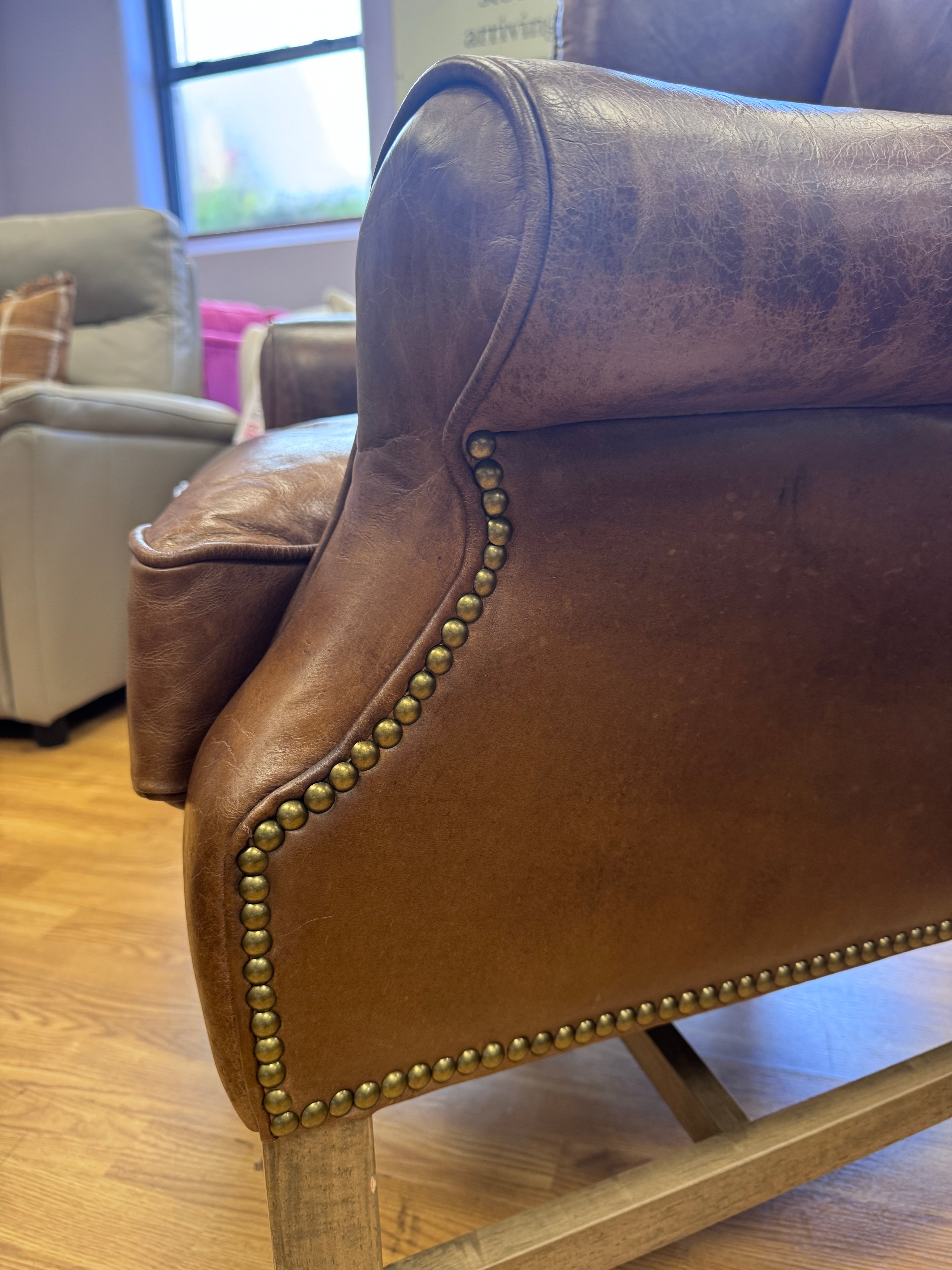 Halo wingback armchair in Cognac leather
