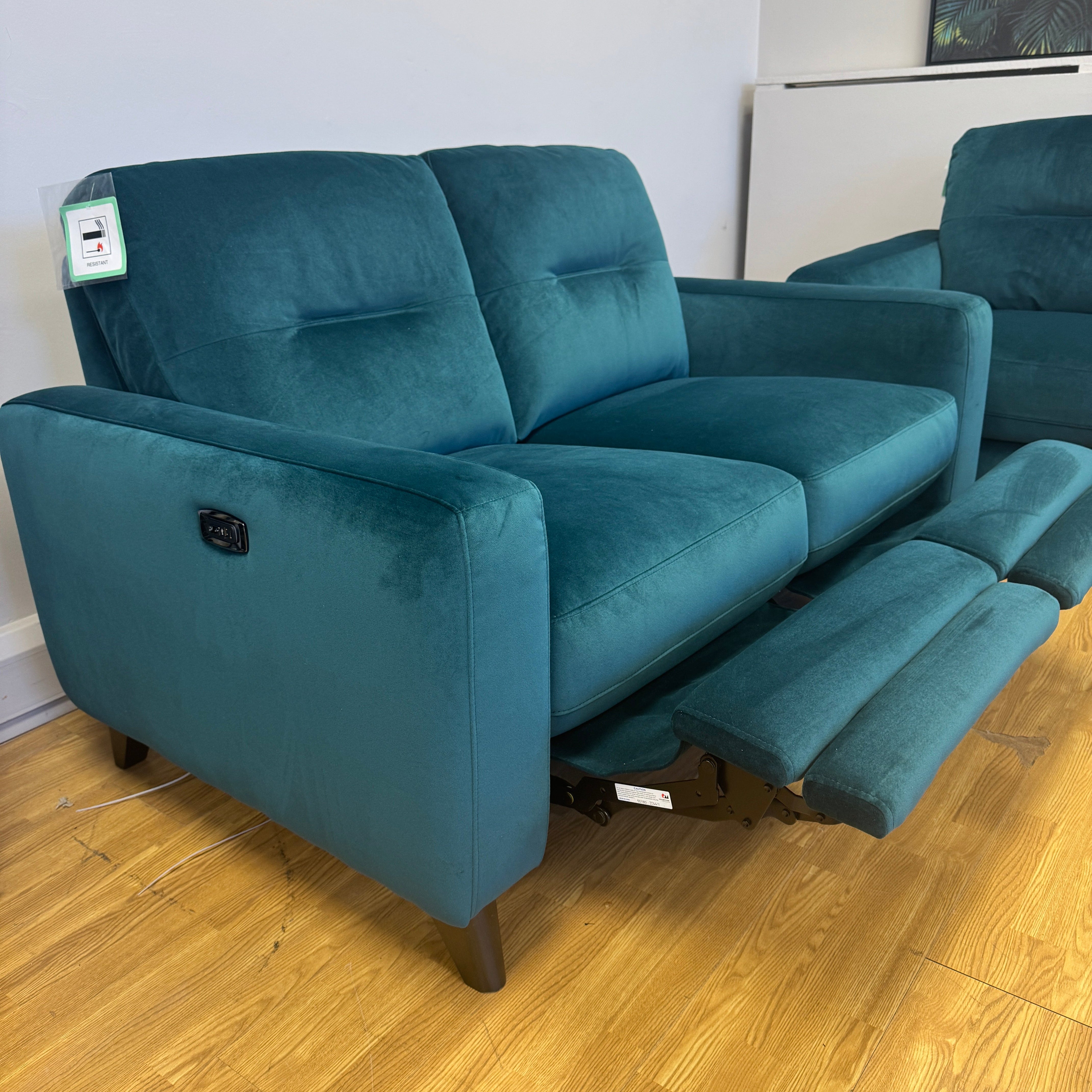 Compact 2 seater sofa with electric incline footrest in Lumino teal velvet (matching pair available)