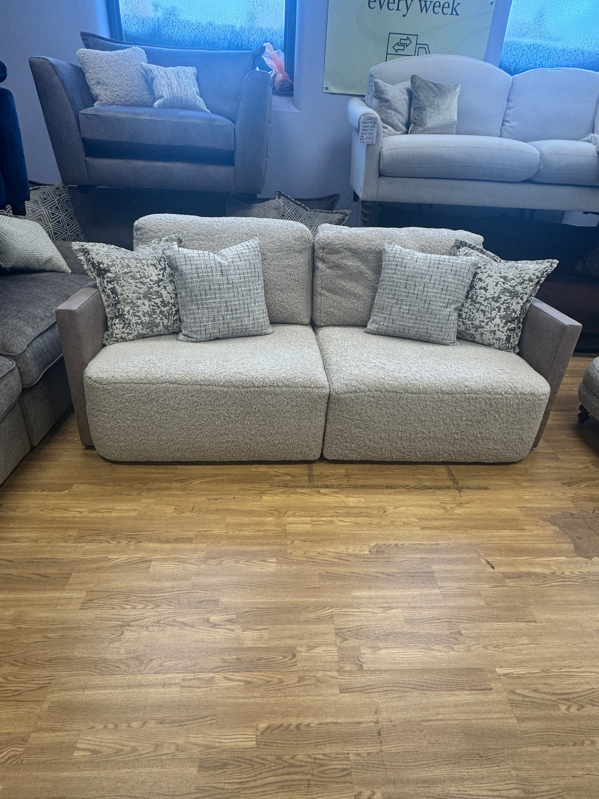 Proto 4 seater split sofa in half faux tan leather and cream borg fabric