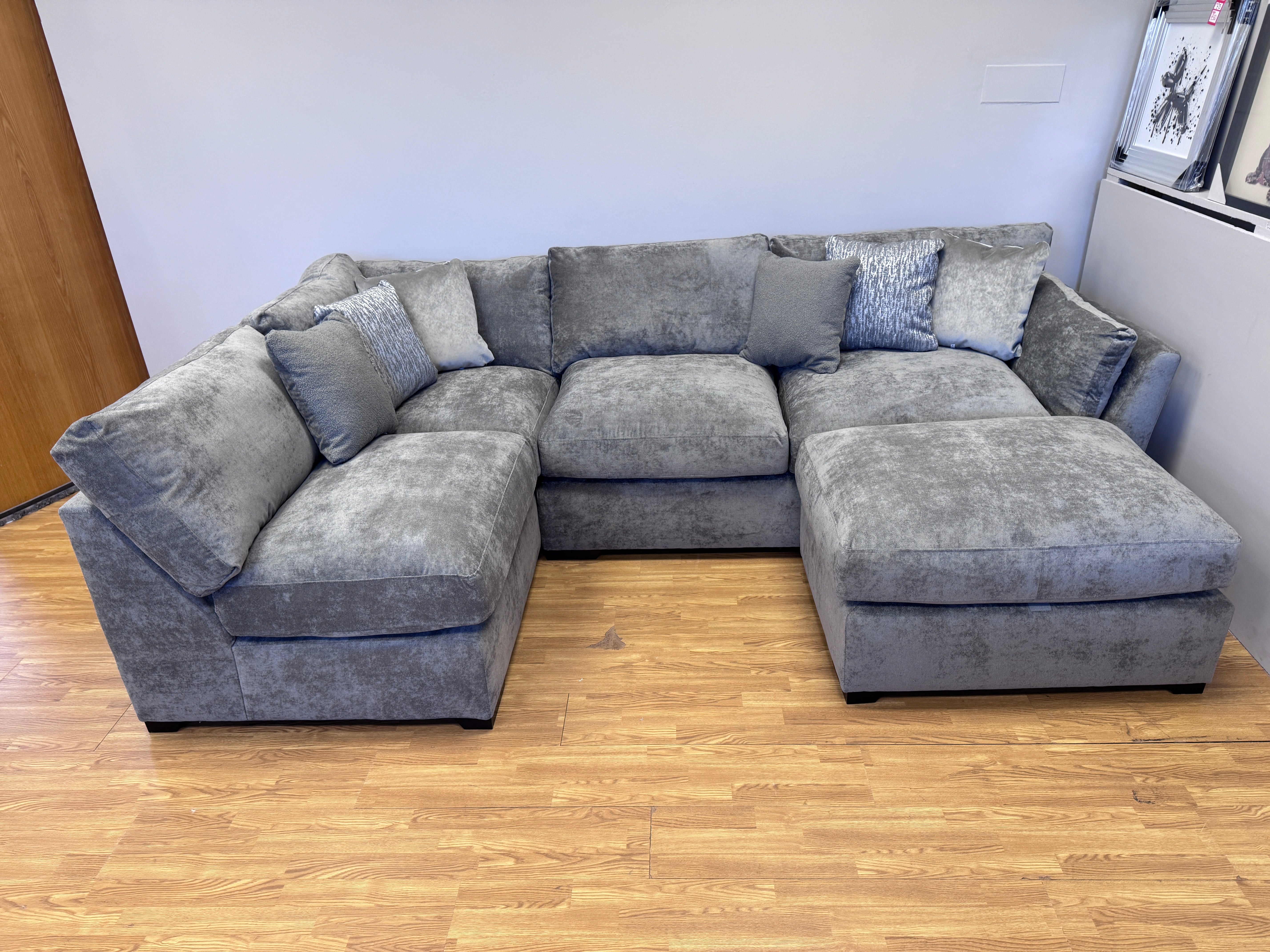 Phoenix left facing corner chaise sofa with footstool in Kingston Grey fabric