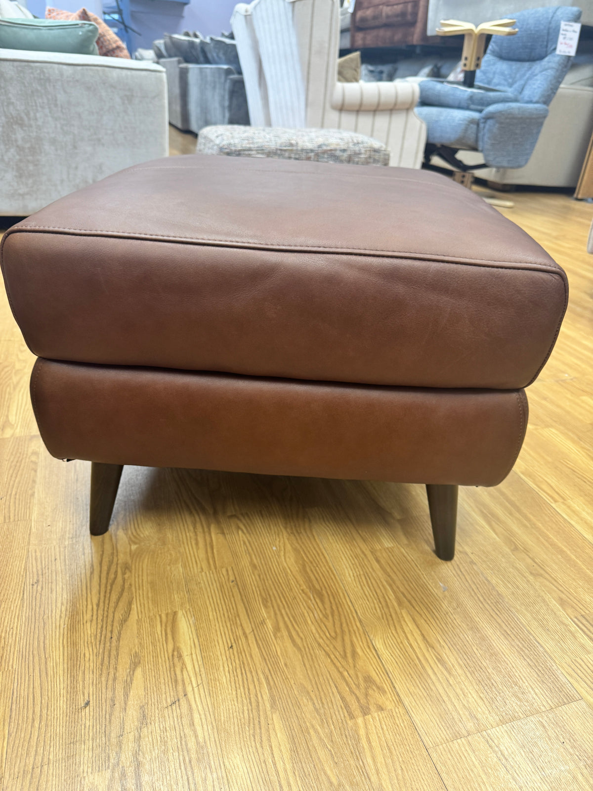 Adler storage footstool in soft tan brown leather
