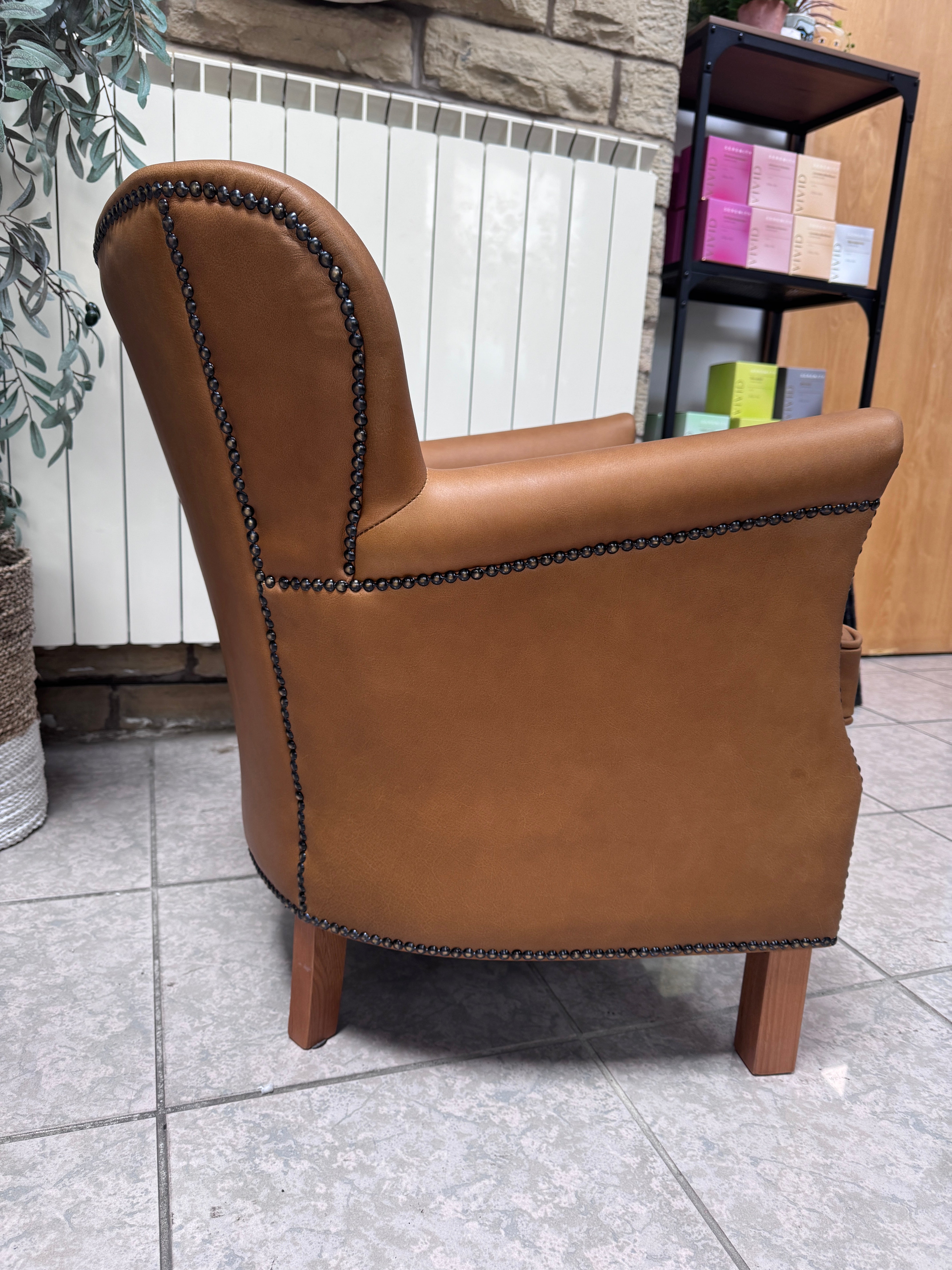 Adam accent chair in Tan brown leather with Natural linen reversible seat pad