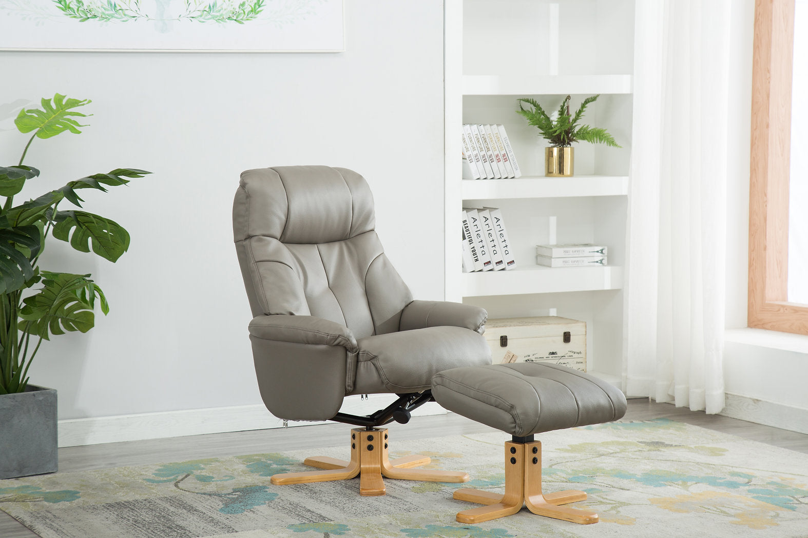Dubai swivel manual reclining accent chair & matching footstool in Plush Faux leather