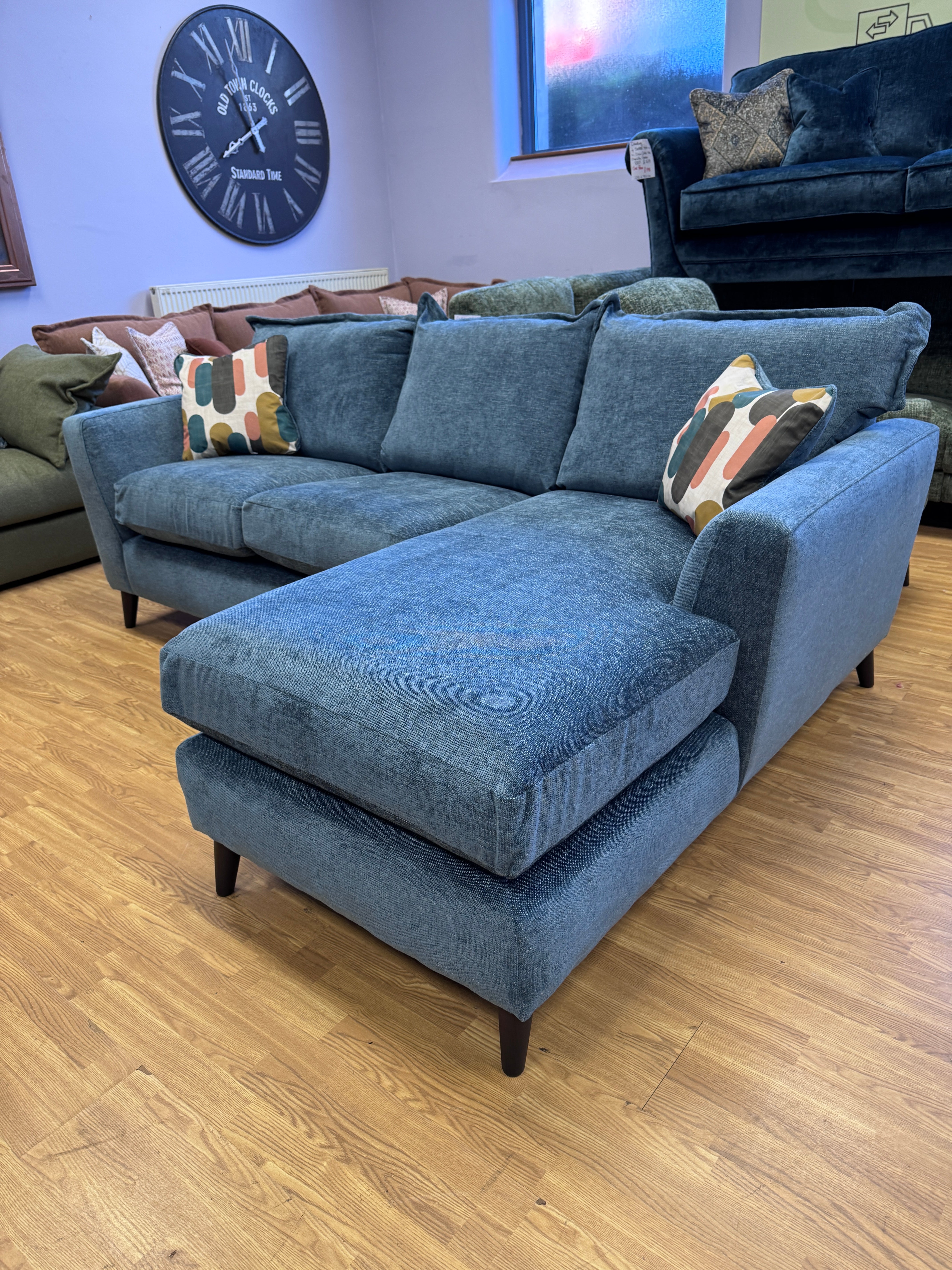 Sofia 3 seater right facing chaise end sofa in Marlon Atlantic blue. fabric