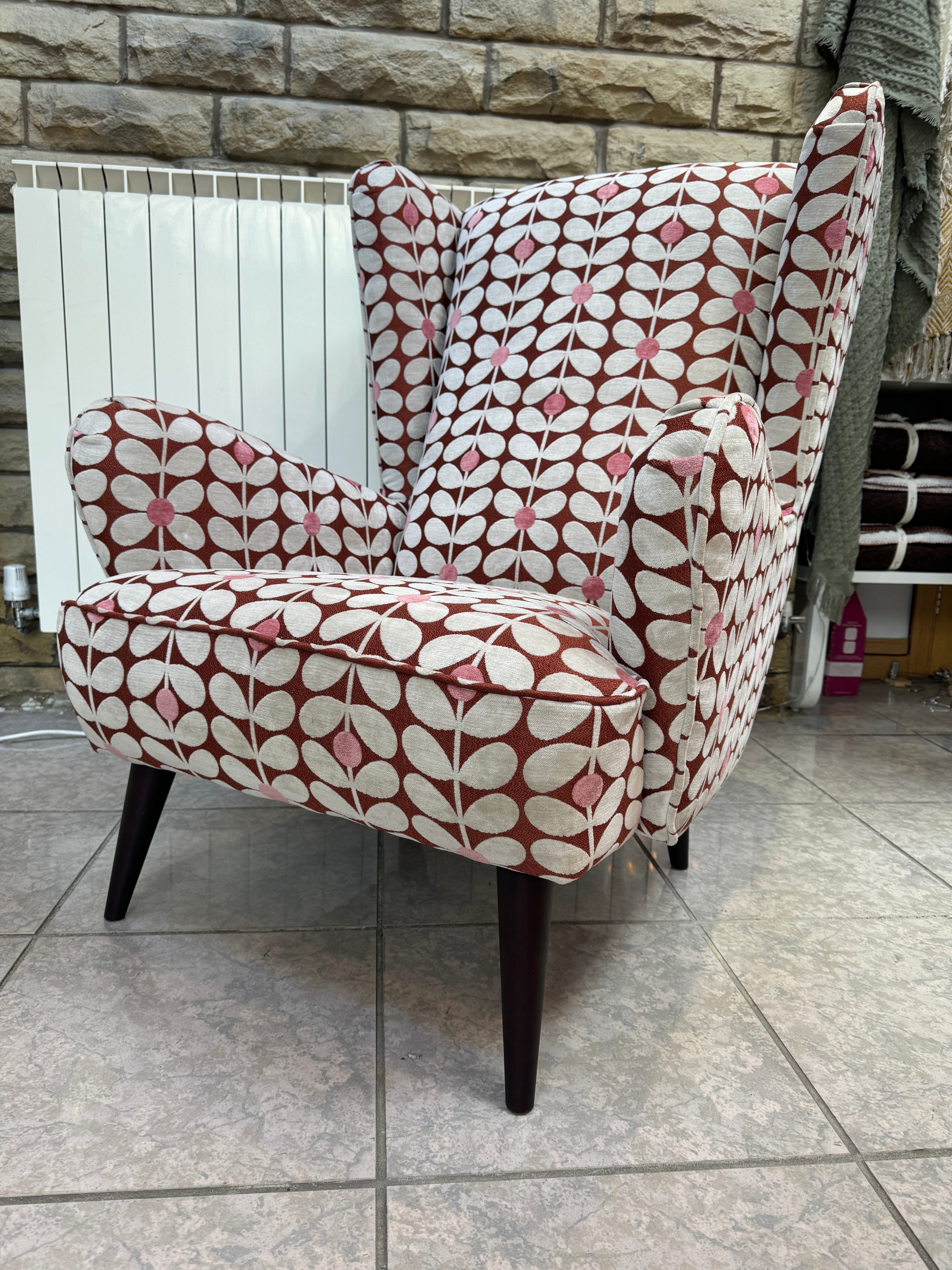 Alma large wingback armchair in Sixties retro stem fabric - RRP £1219