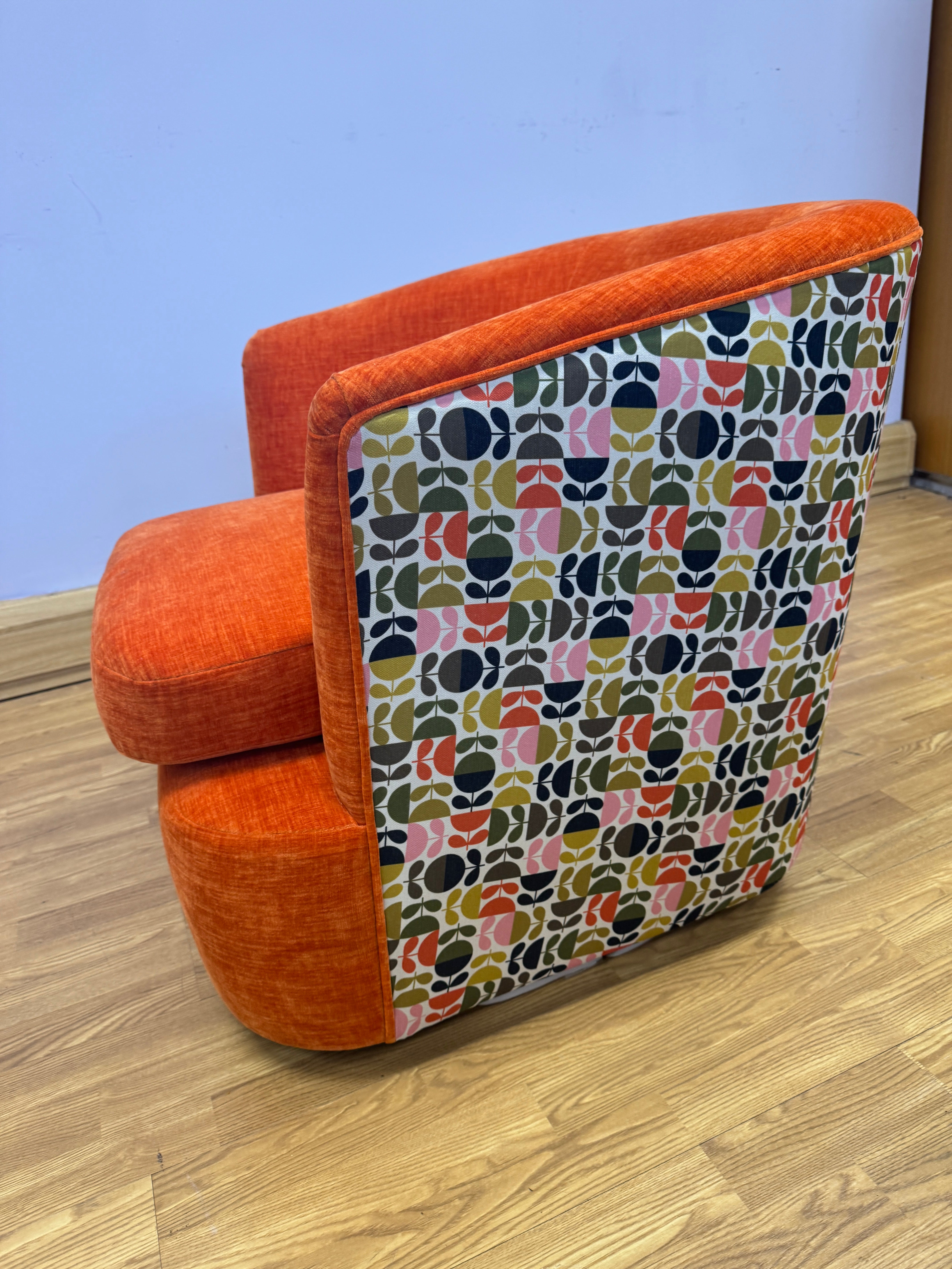 Orla Kiely Callan swivel base chair in Orange velvet with Jigsaw pink ochre back