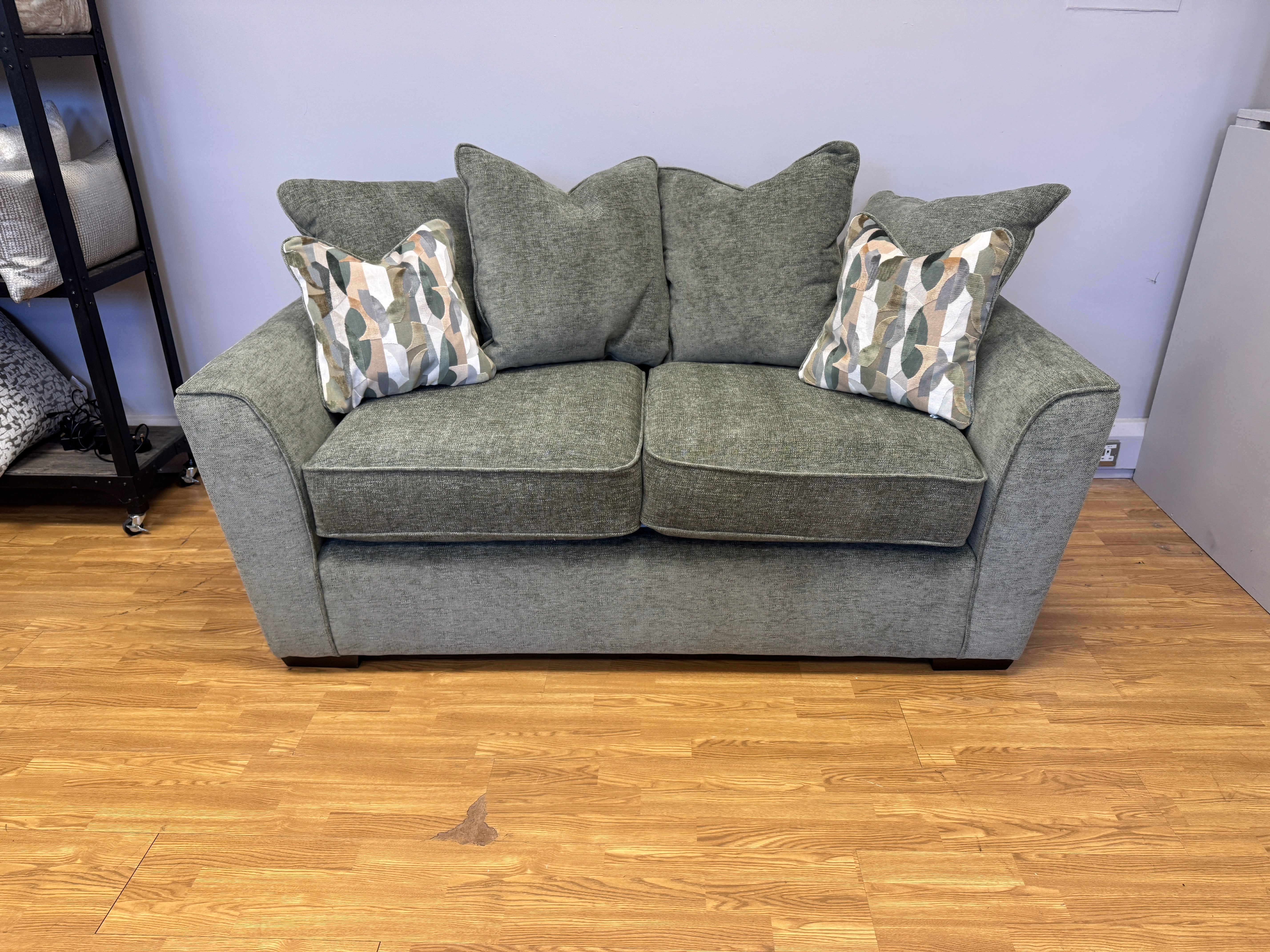 Caspian 2 seater cushion back sofa in Marlon Botanic green fabric