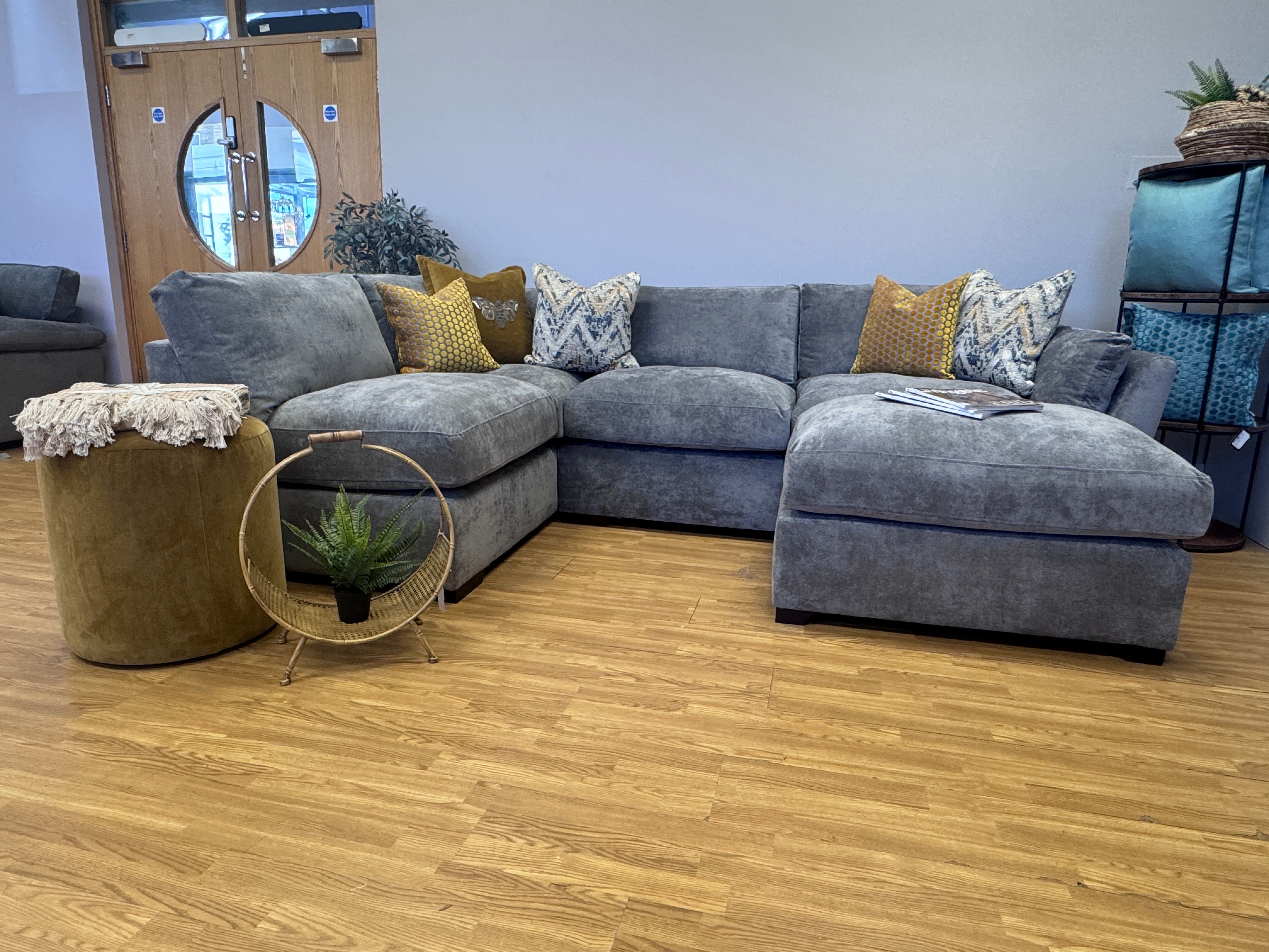 Phoenix left facing corner chaise sofa with footstool in Kingston Grey fabric