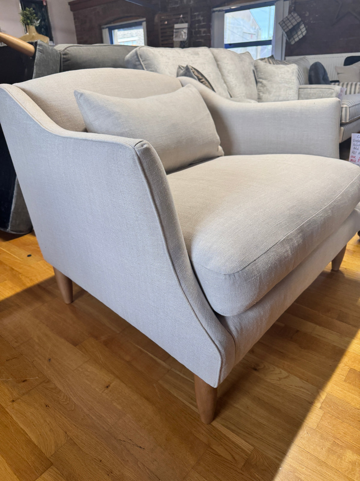 Haygarth loveseat / cuddle chair in natural linen fabric