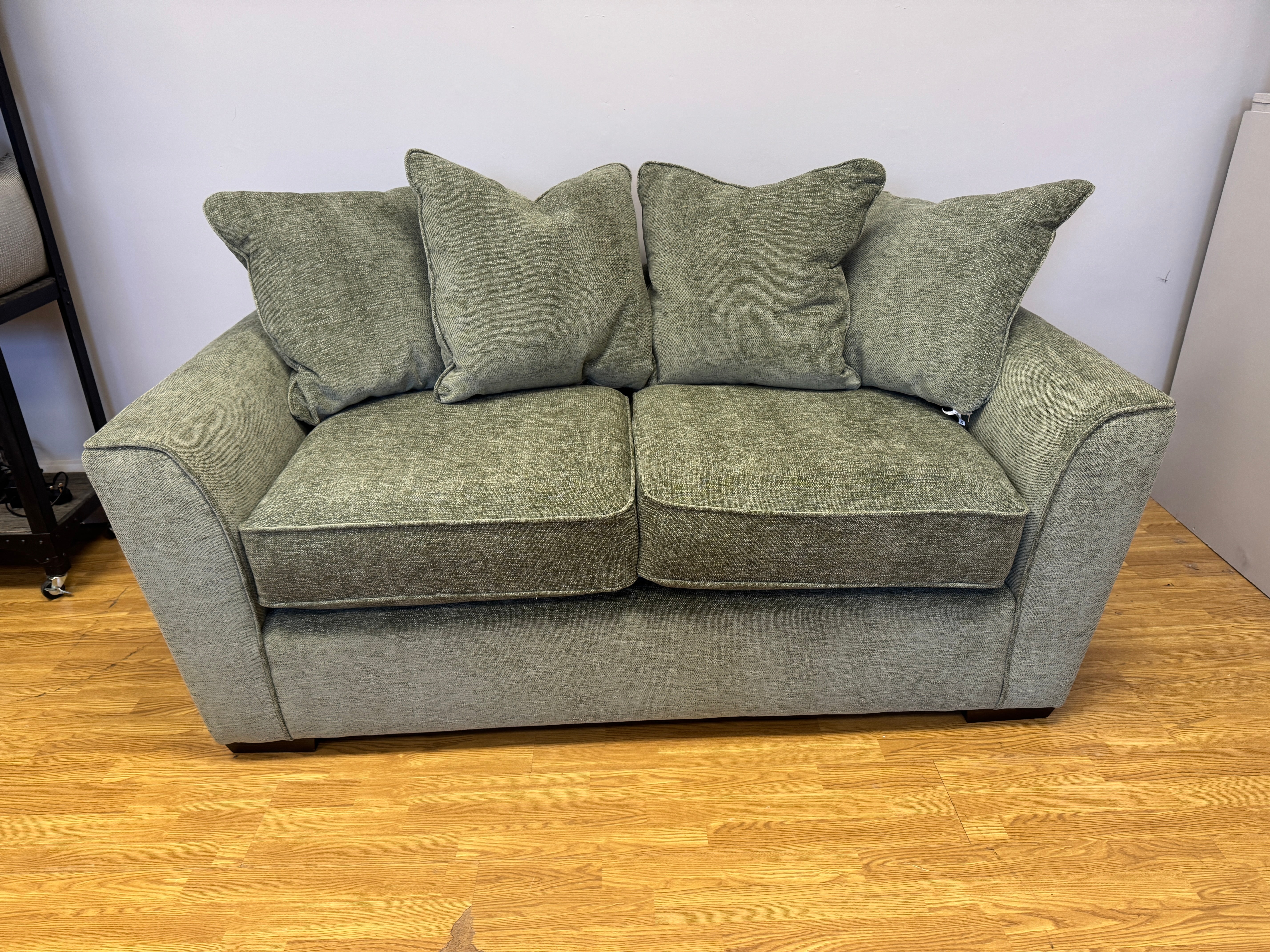 Caspian 2 seater cushion back sofa in Marlon Botanic green fabric