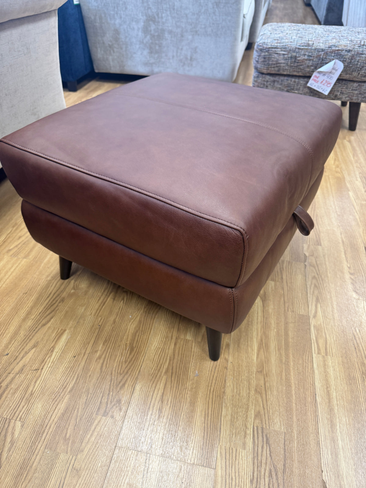 Adler storage footstool in soft tan brown leather