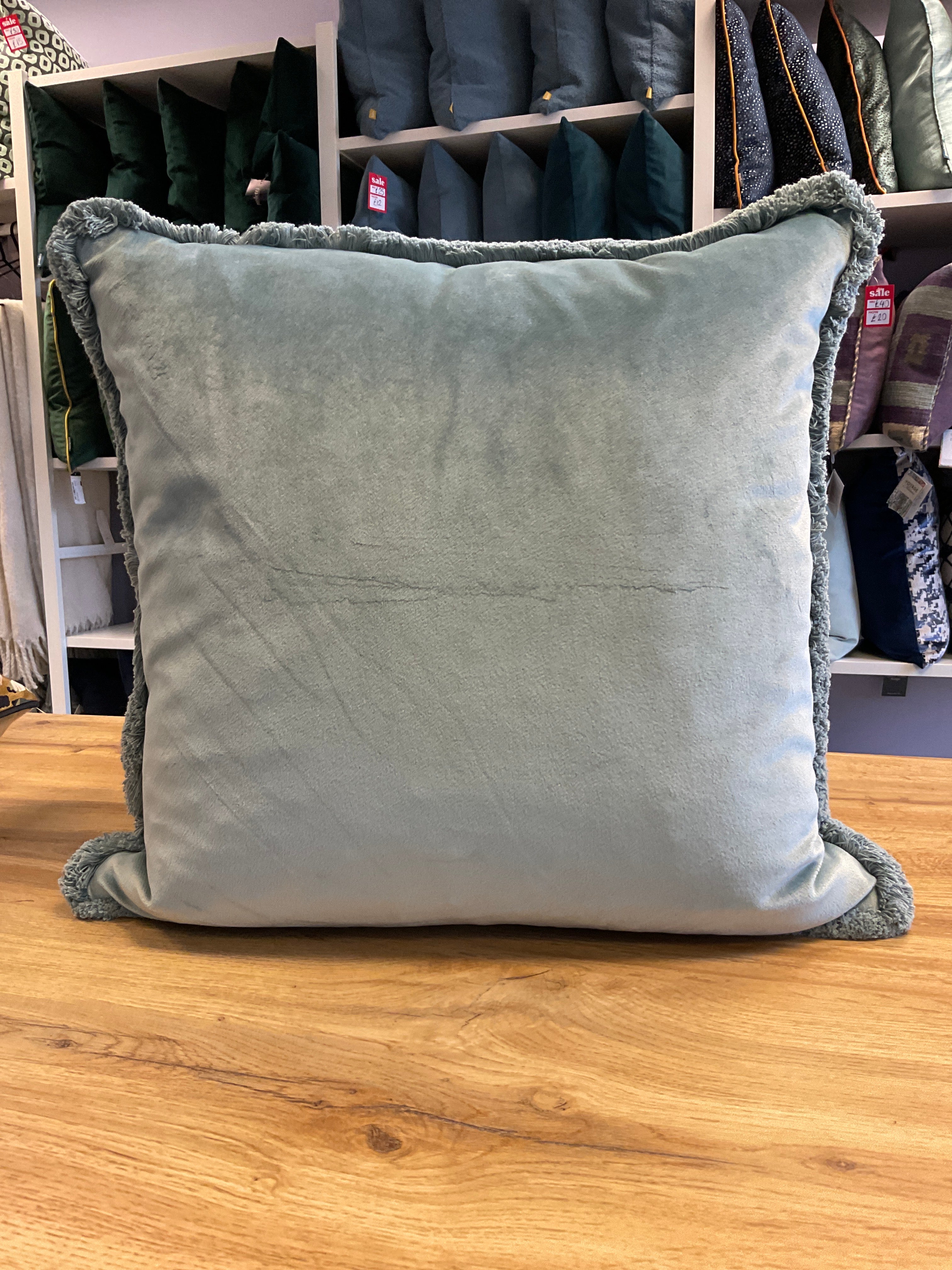 Freya 45 x 45cm cushion in Wedgewood blue plain velvet with fringe edge