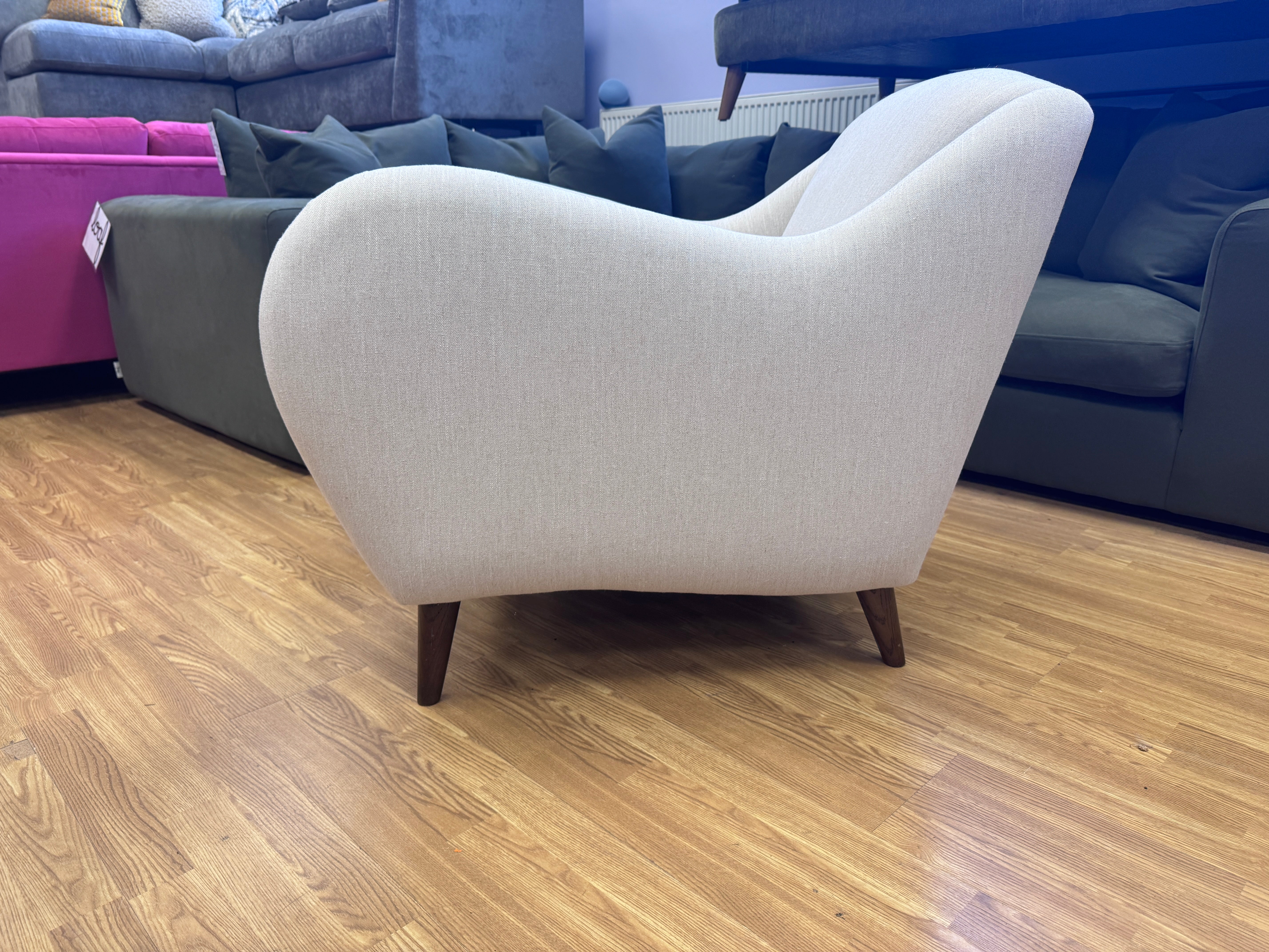 Sample fireside accent chair in Thatch house fabric