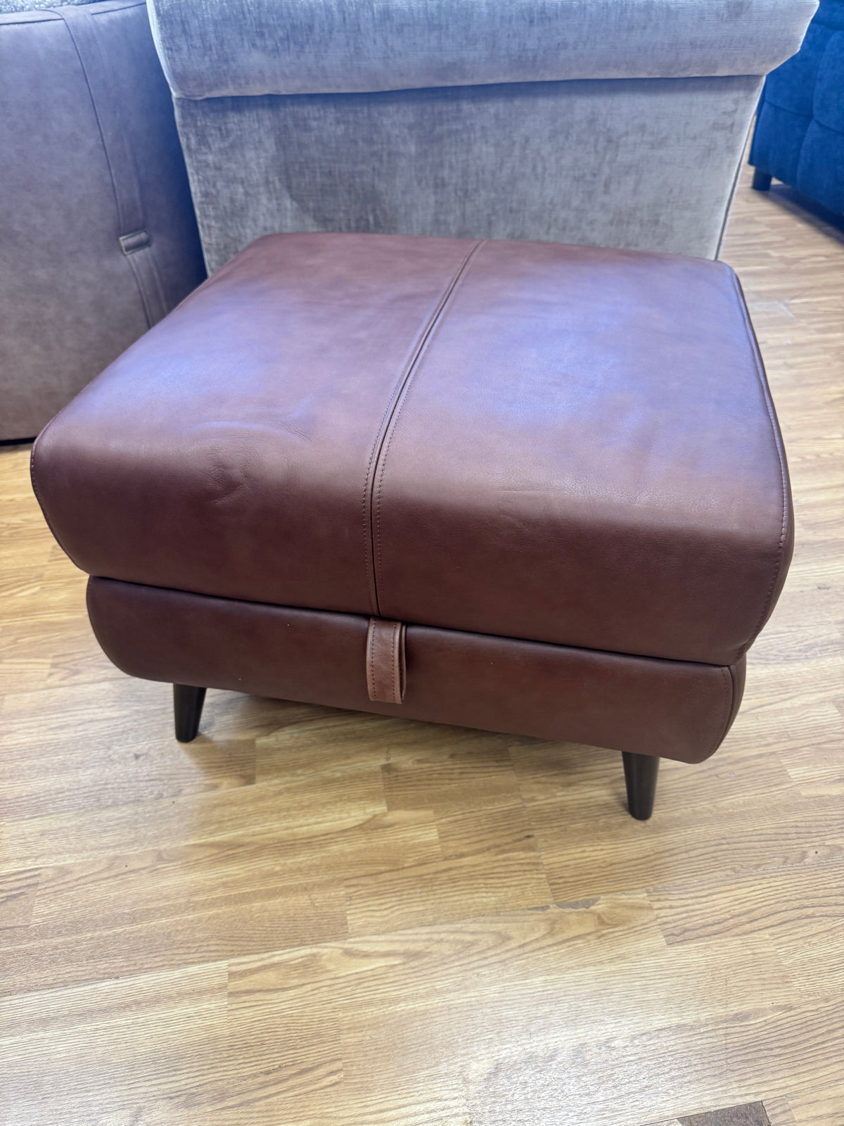 Adler storage footstool in soft tan brown leather