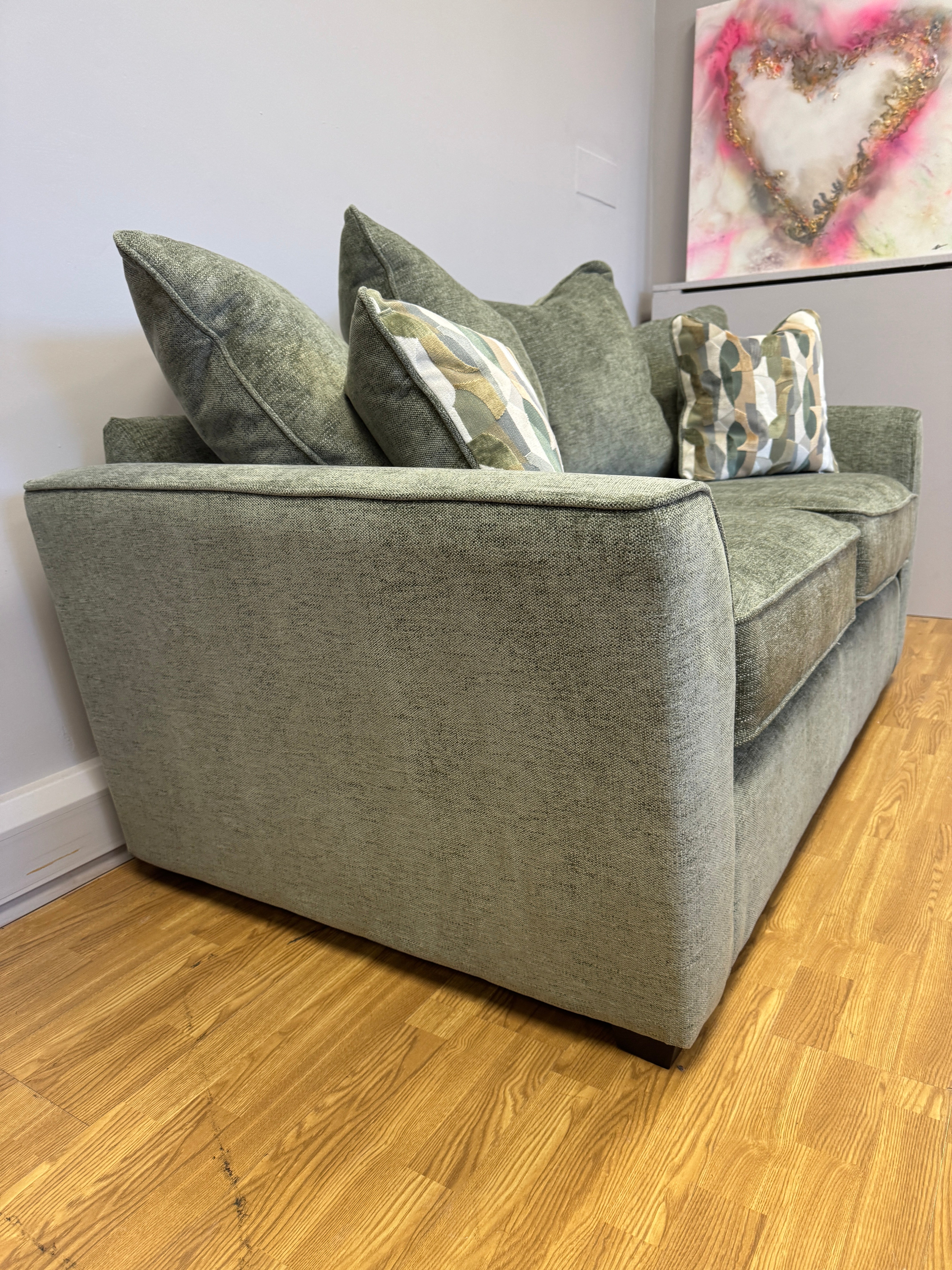 Caspian 2 seater cushion back sofa in Marlon Botanic green fabric