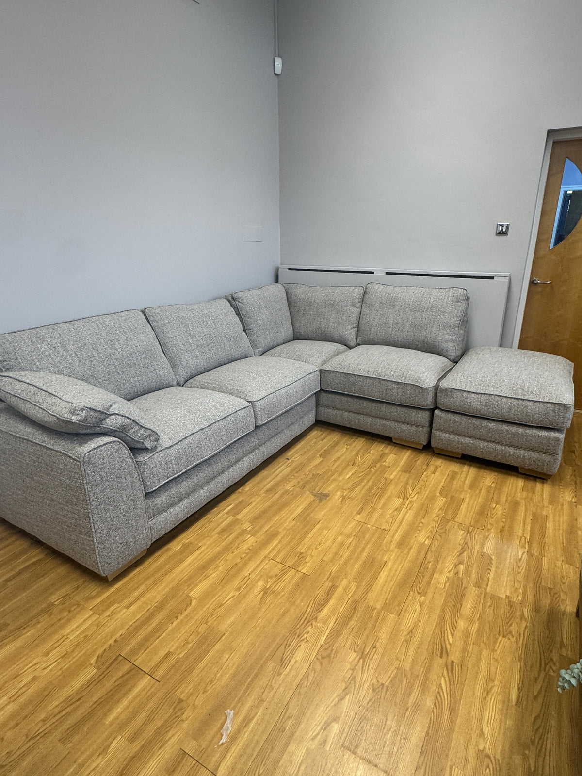 Proto right facing open corner sofa with footstool in Osaka Coppice fabric