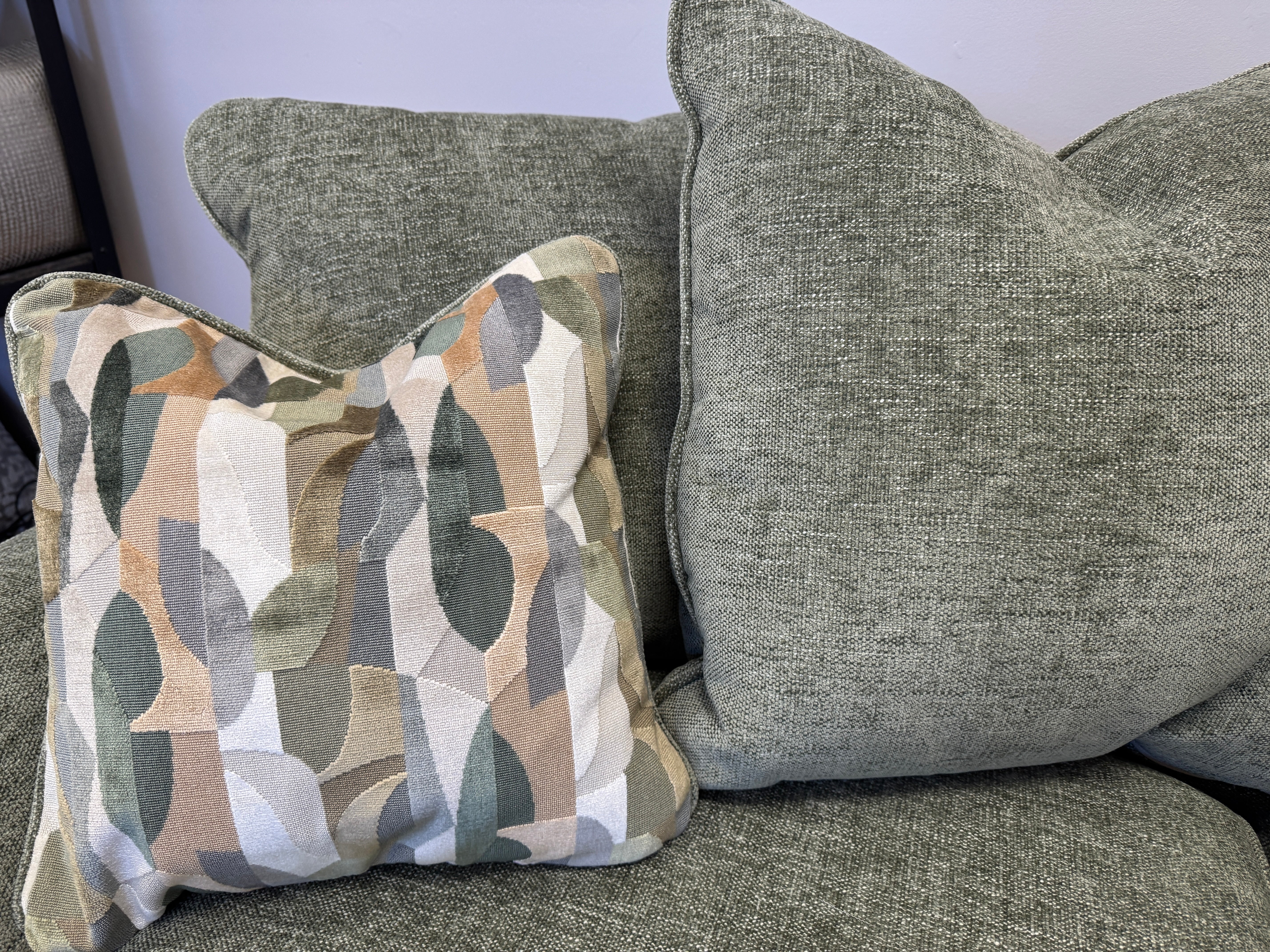 Caspian 2 seater cushion back sofa in Marlon Botanic green fabric