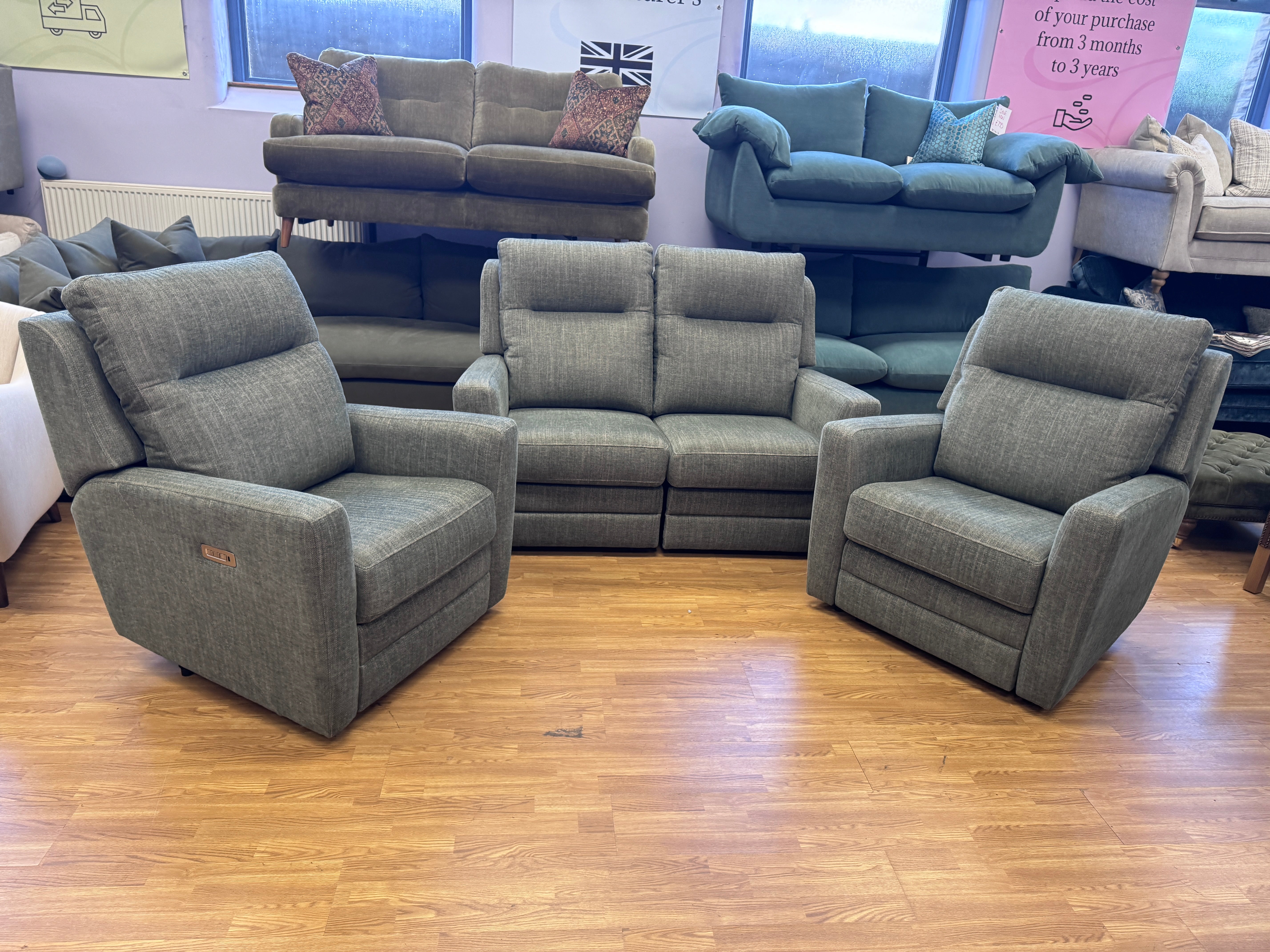Parker Knoll Chicago electric reclining armchair with lumbar support in Green herringbone fabric