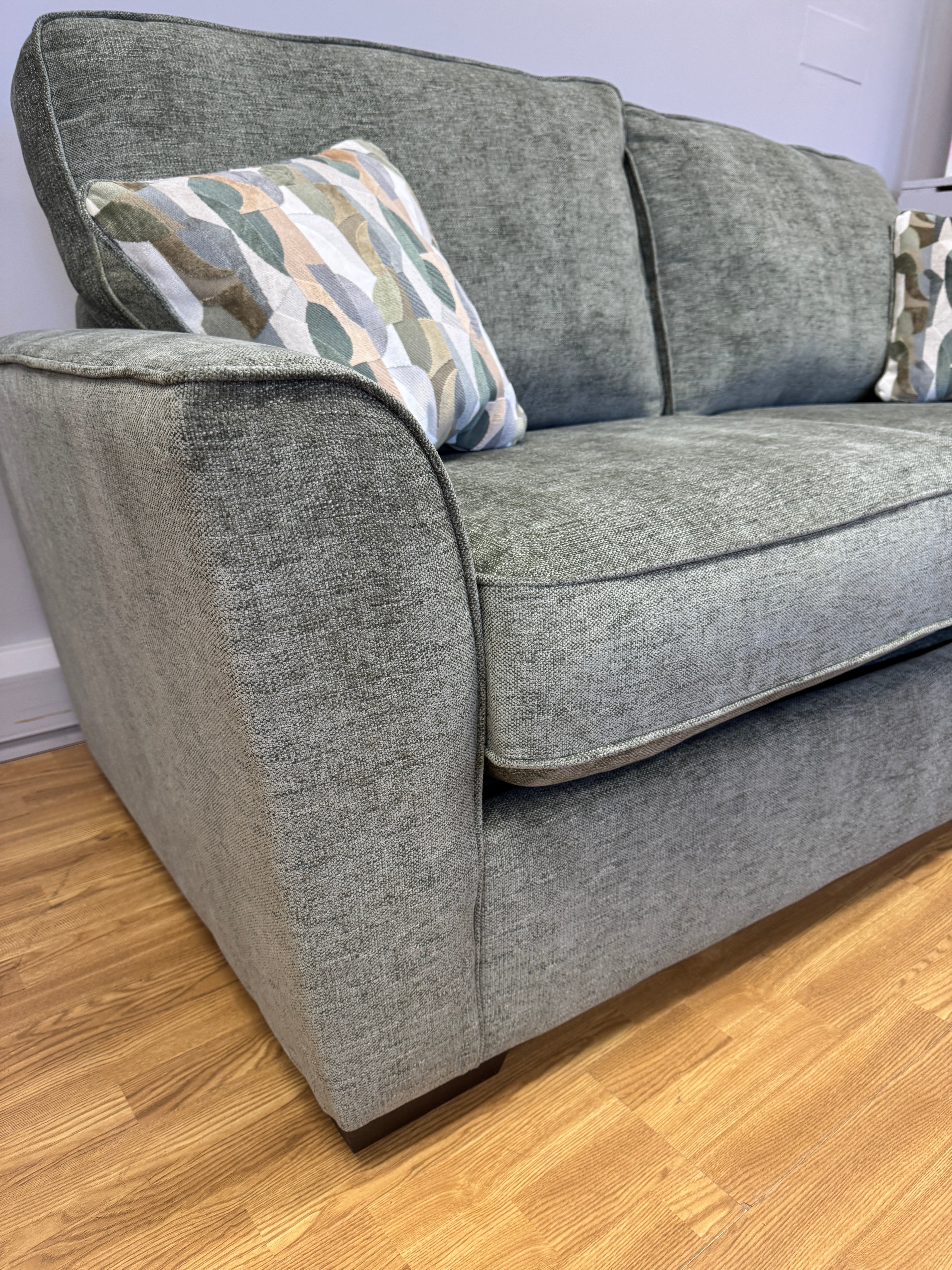 Caspian 3 seater sofa bed in Marlon Botanic green fabric