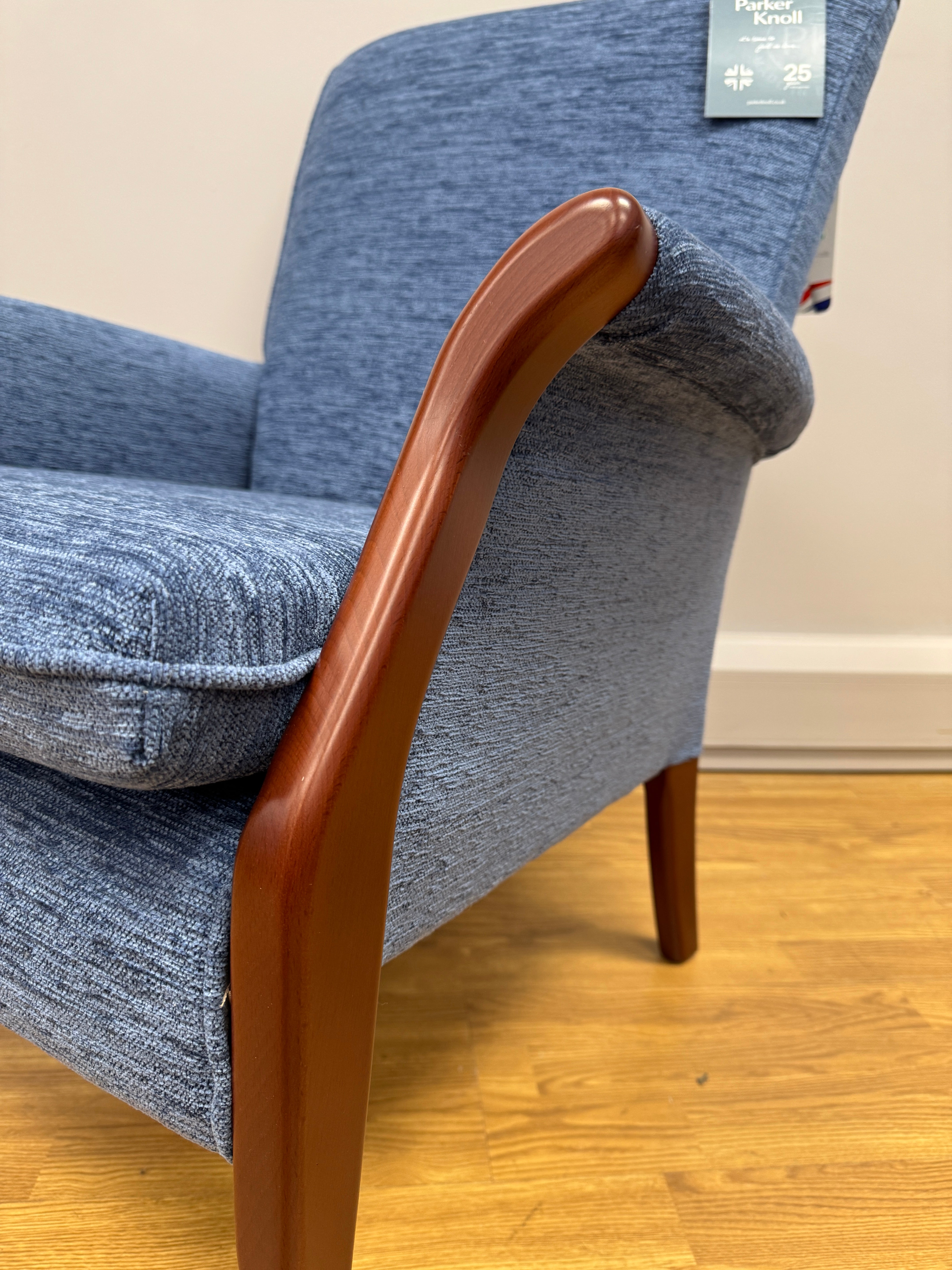 Parker Knoll Froxfield fireside chair in marine blue fabric with cherry wood frame