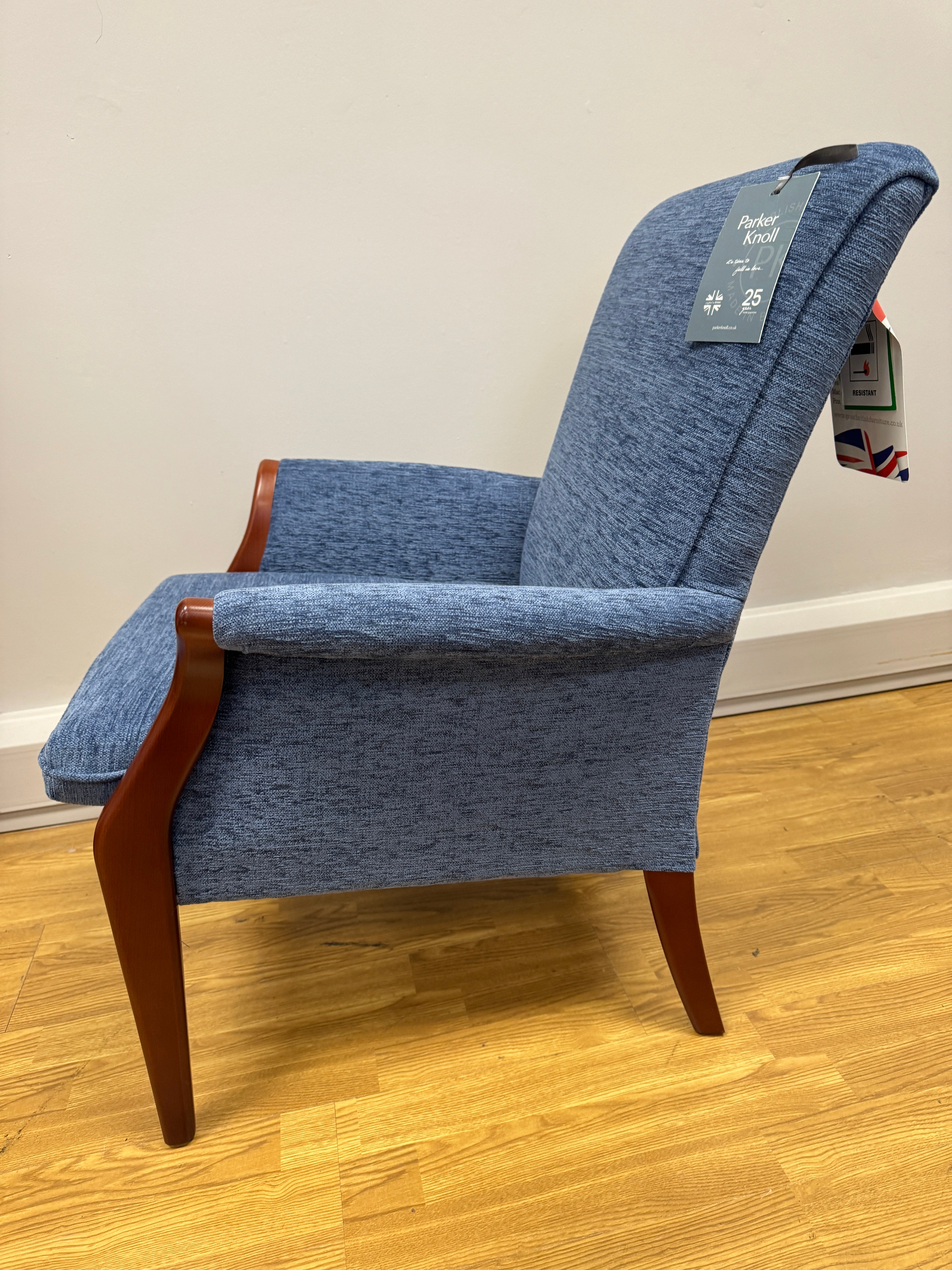 Parker Knoll Froxfield fireside chair in marine blue fabric with cherry wood frame