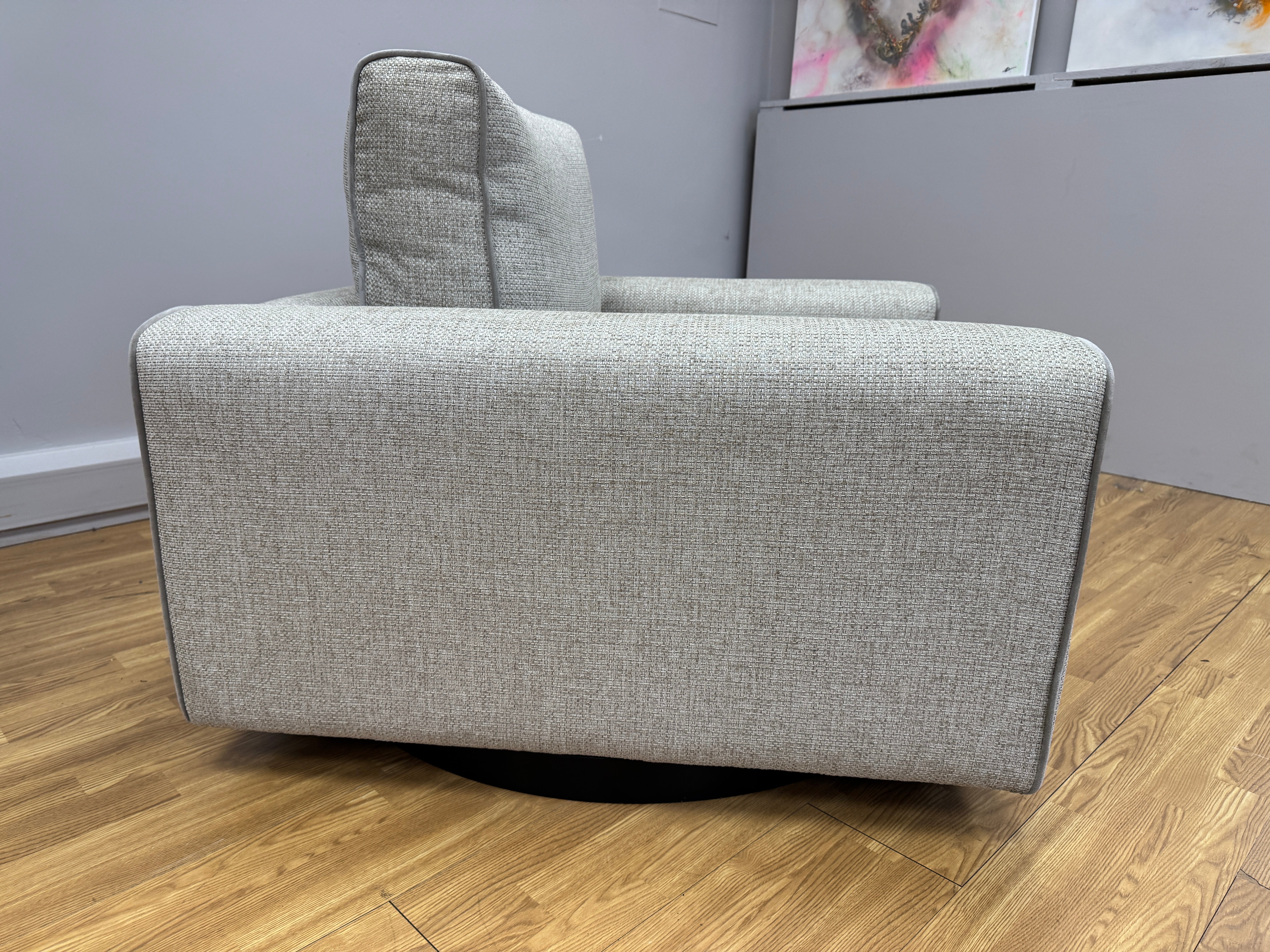 Sofology Stirling armchair on swivel base in chunky woven stone fabric