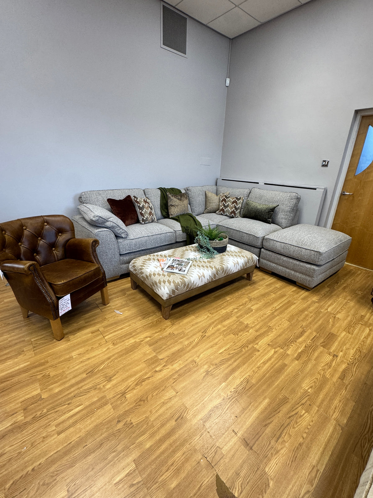 Proto right facing open corner sofa with footstool in Osaka Coppice fabric