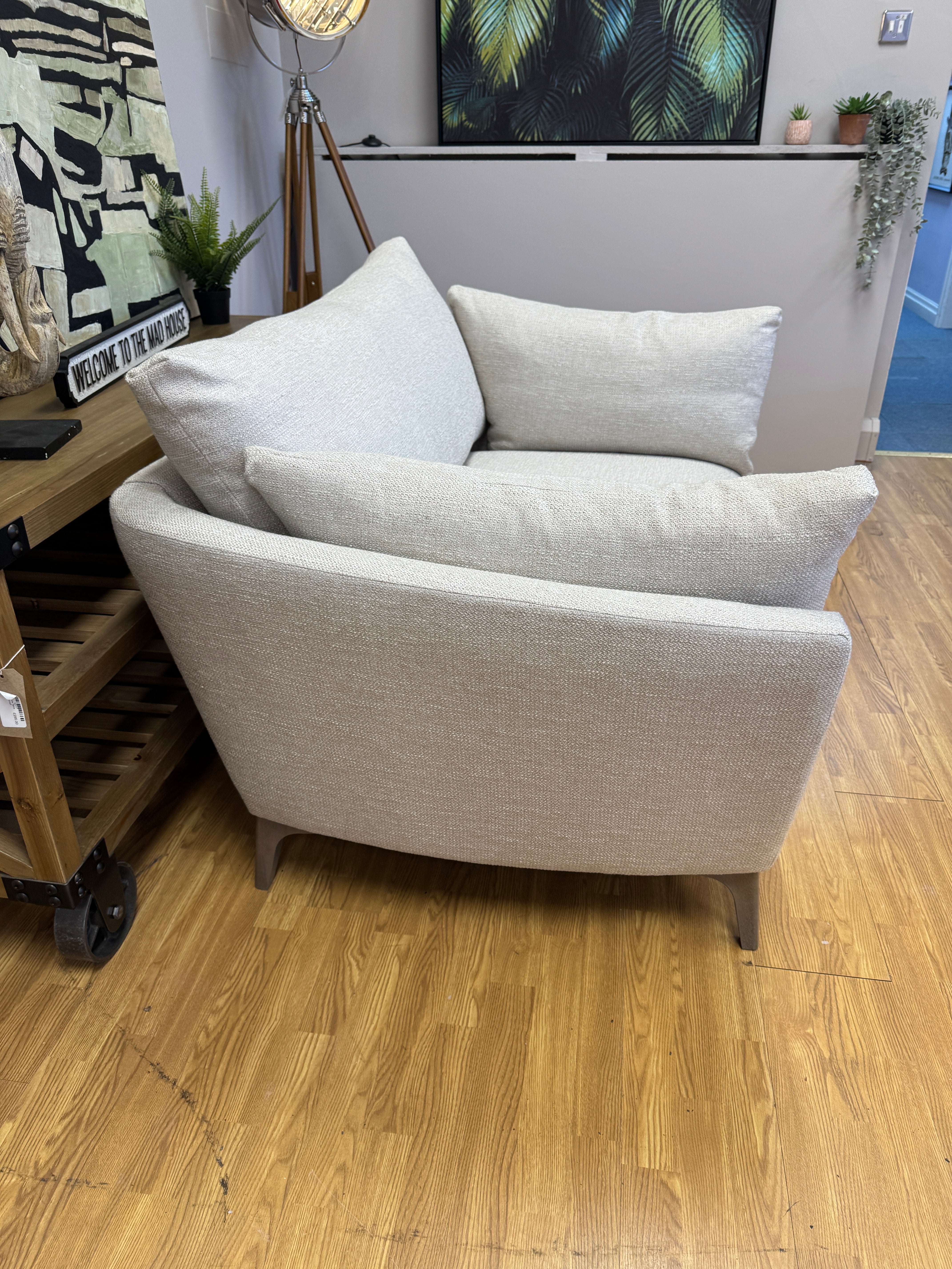 Elton curved sided loveseat in natural linen fabric