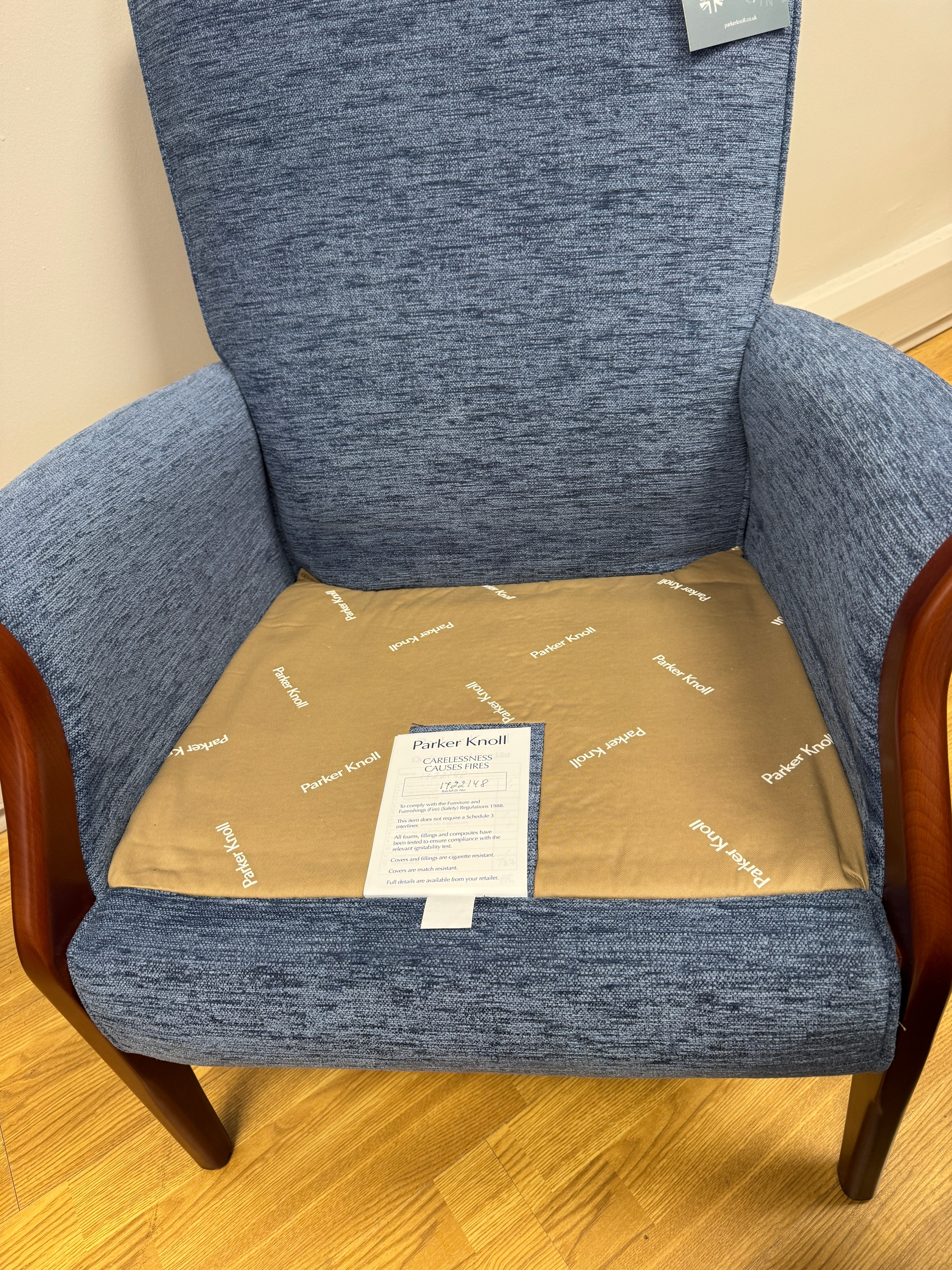 Parker Knoll Froxfield fireside chair in marine blue fabric with cherry wood frame