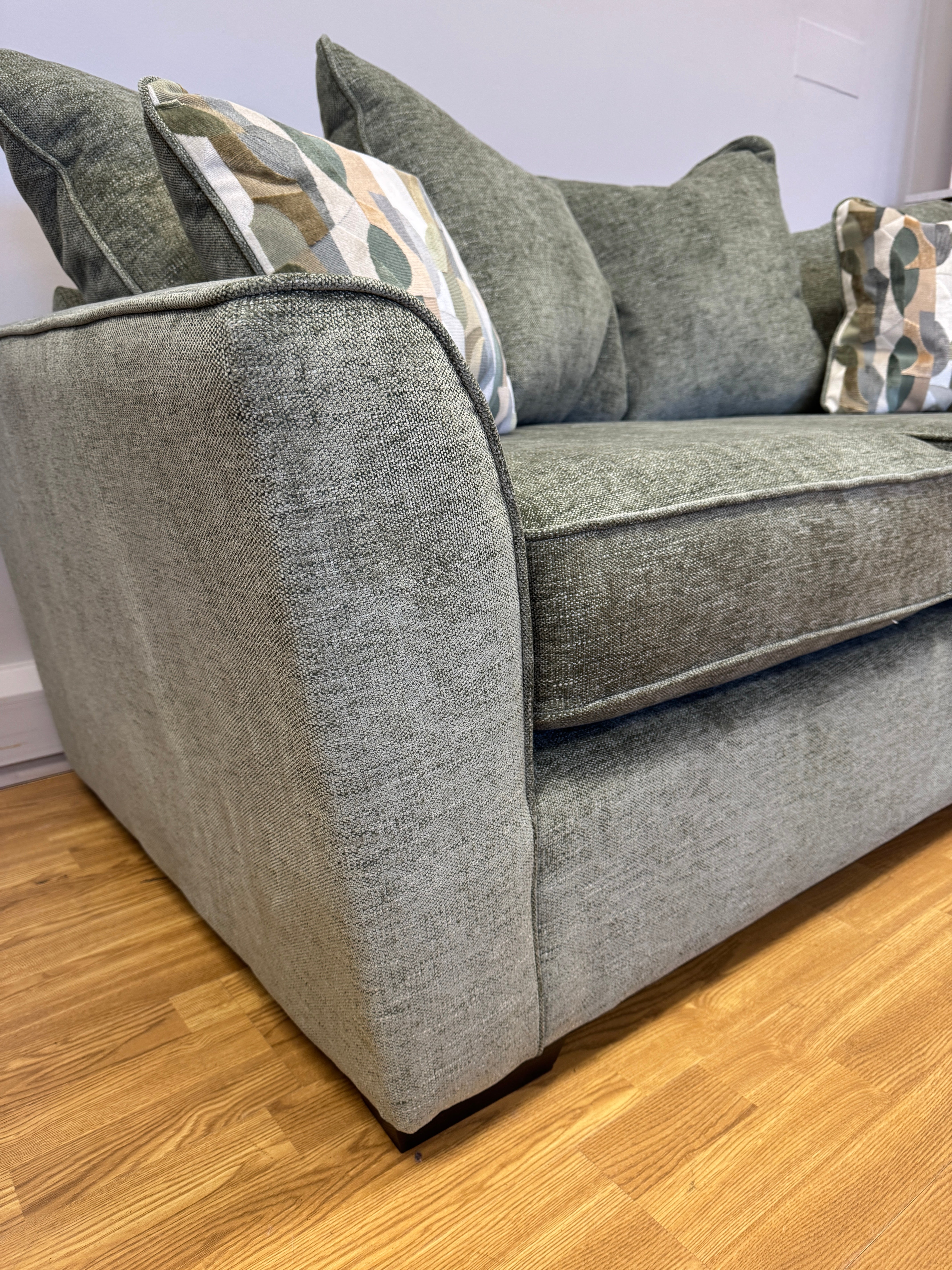 Caspian 2 seater cushion back sofa in Marlon Botanic green fabric