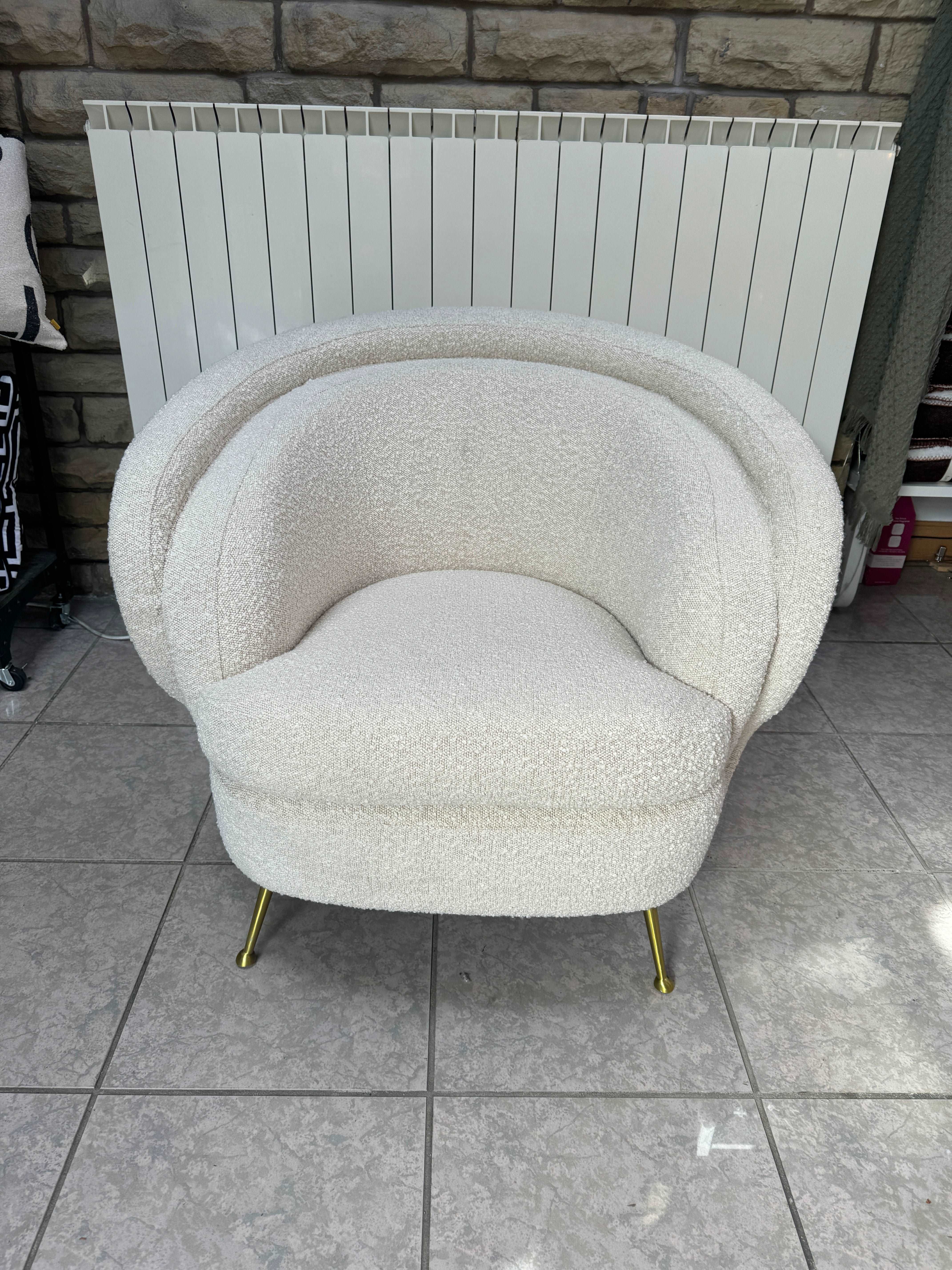 Eichholtz Orion curved back accent chair in cream boucle fabric