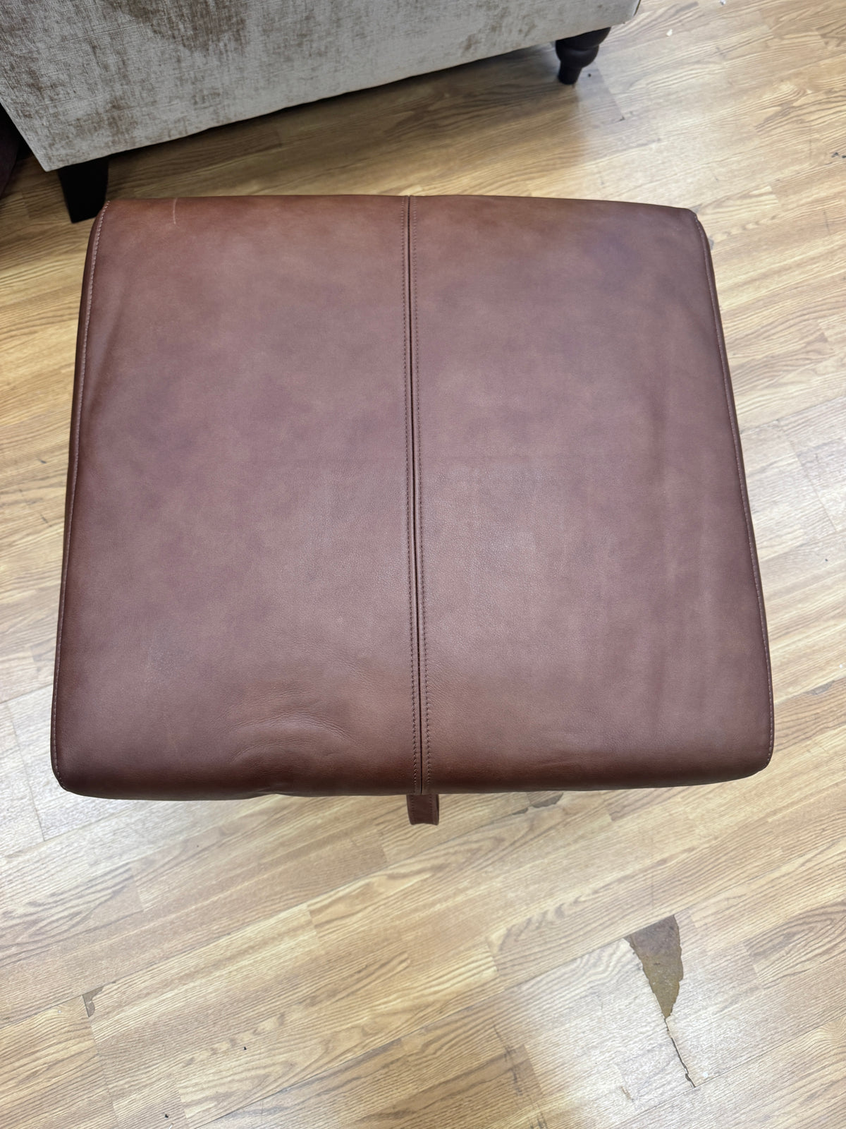 Adler storage footstool in soft tan brown leather