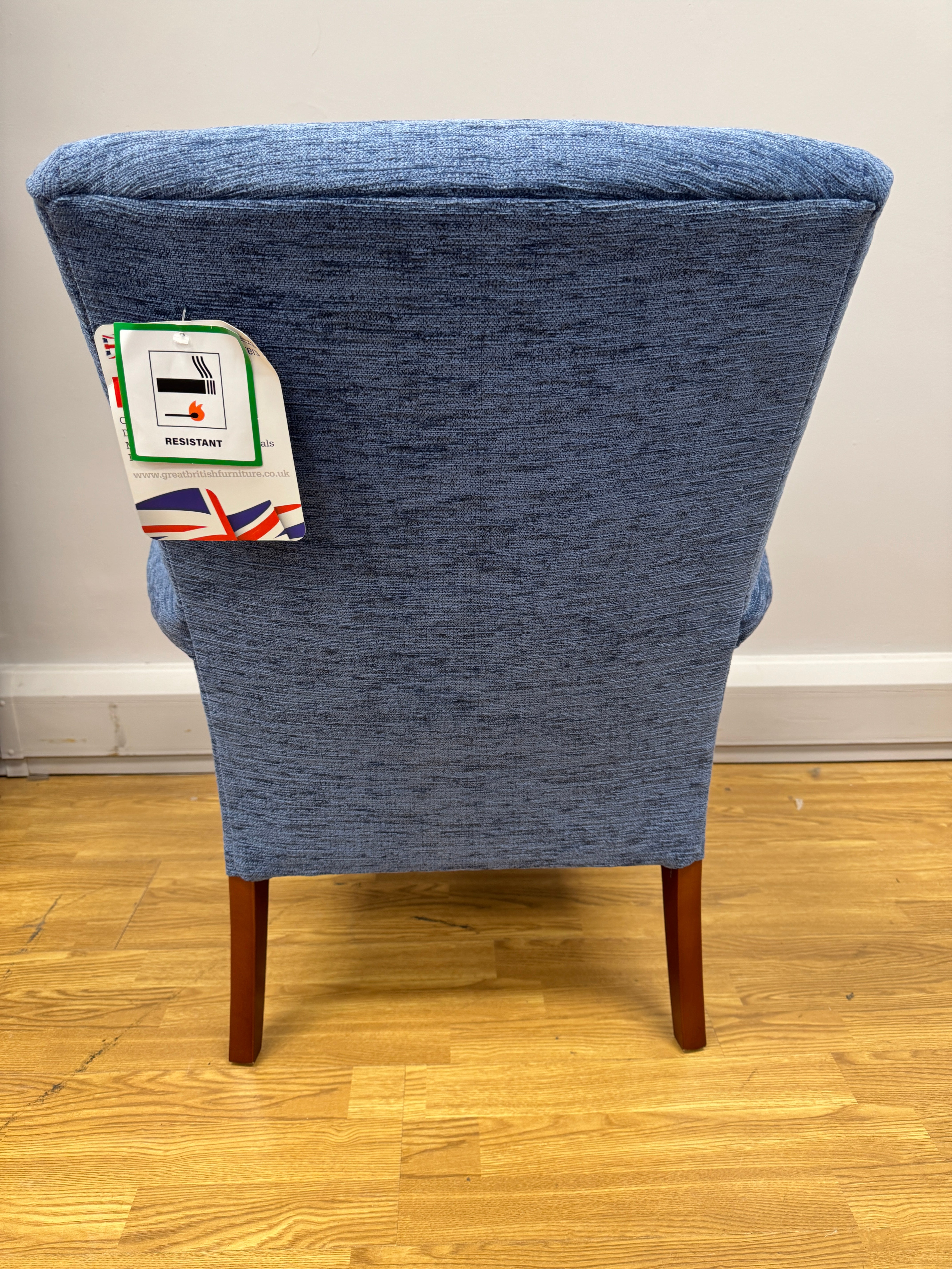 Parker Knoll Froxfield fireside chair in marine blue fabric with cherry wood frame