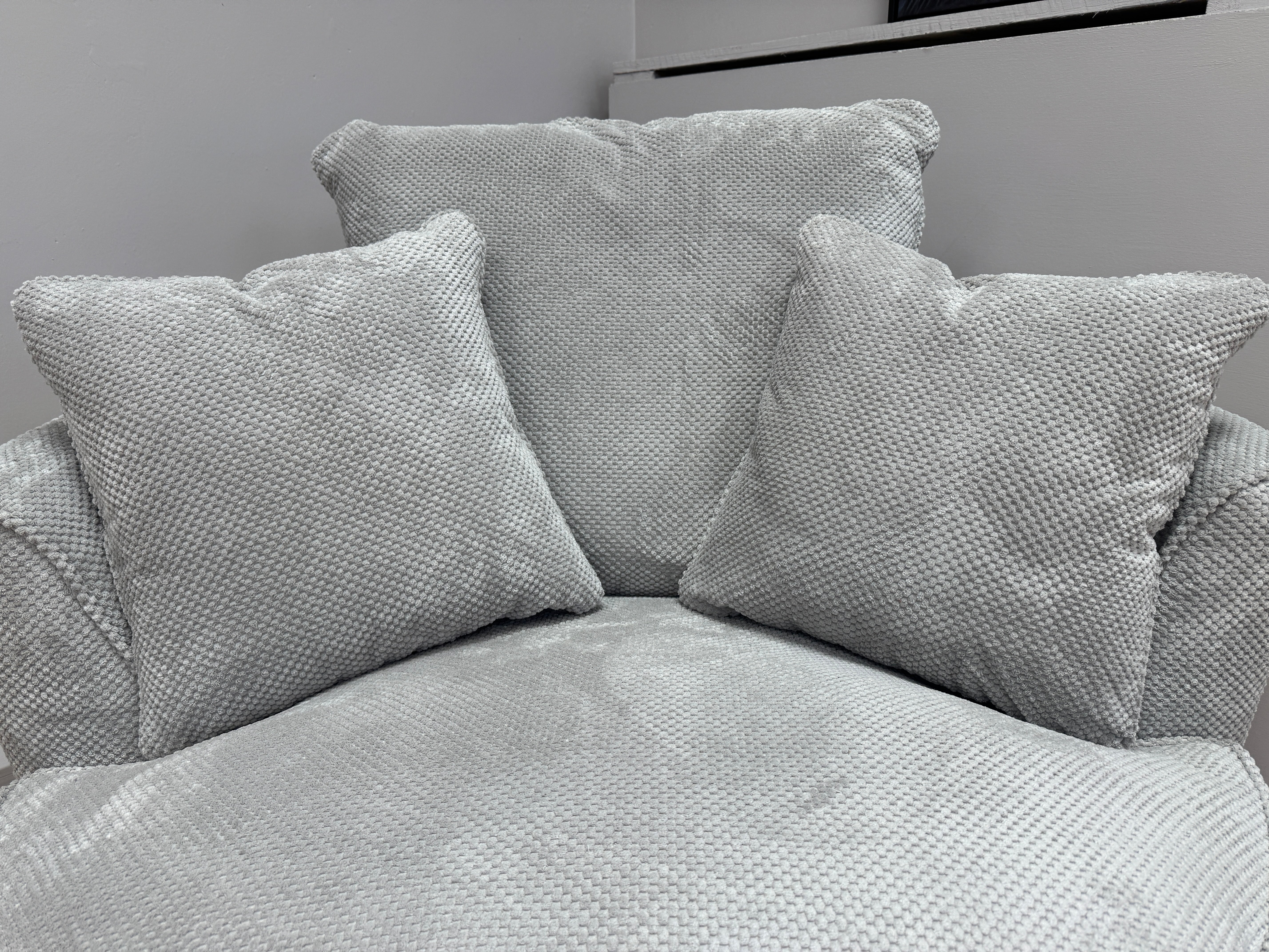 Bloom round loveseat with swivel base in Aero Silver bubble fabric