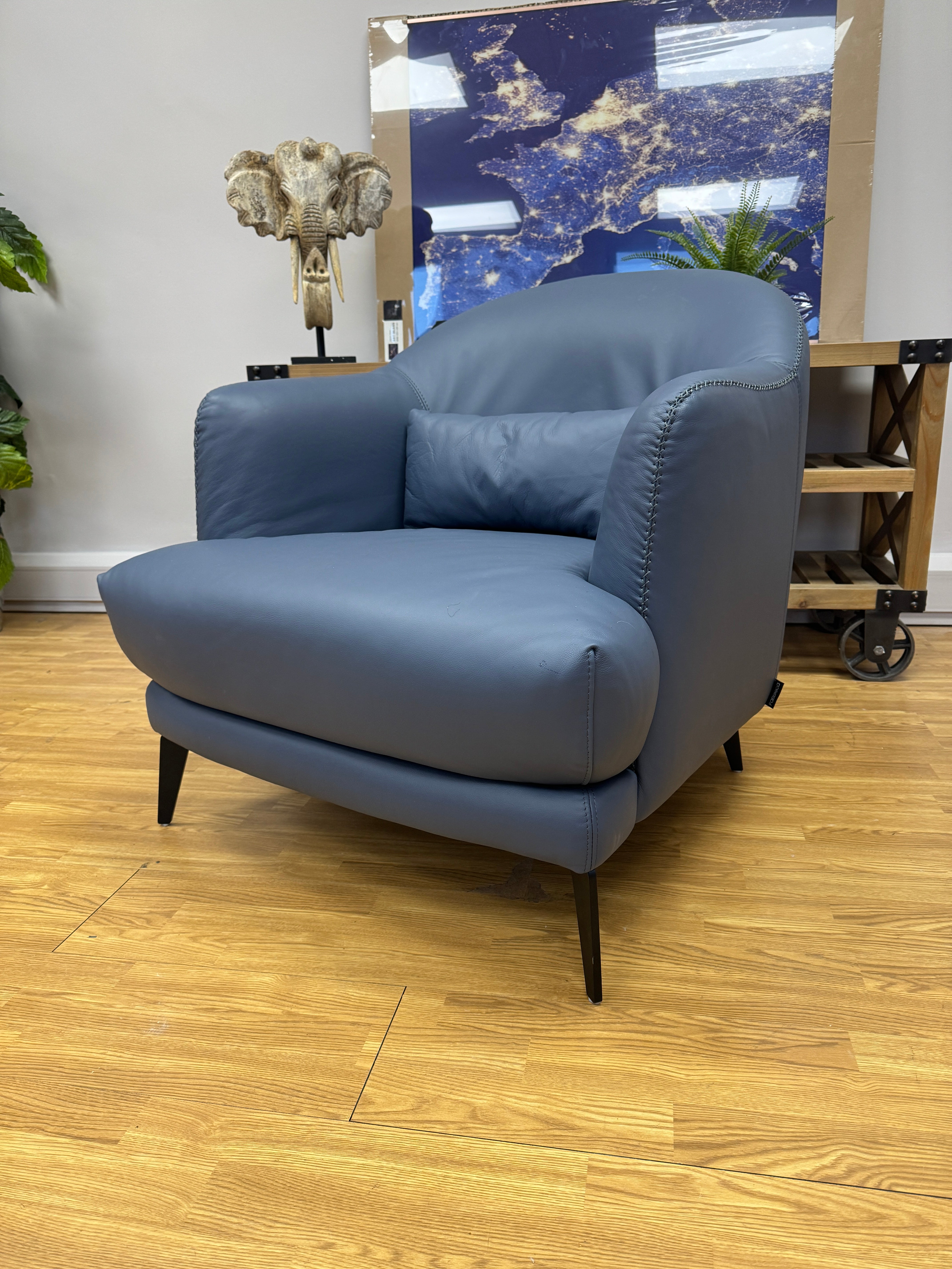 Kartik curved armchair in full blue leather