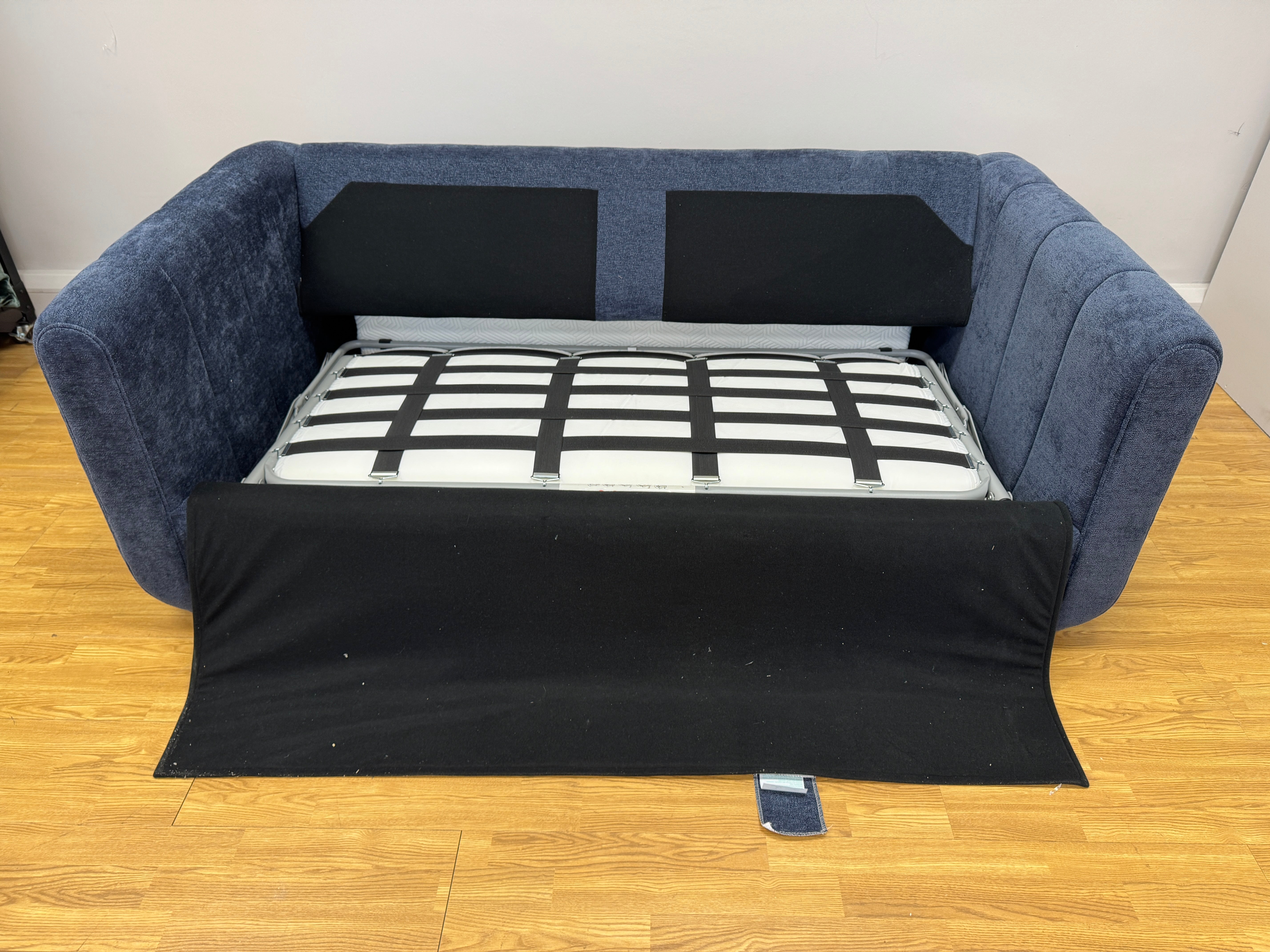 Sofology Islington 2.5 seater sofa bed in navy blue chenille fabric