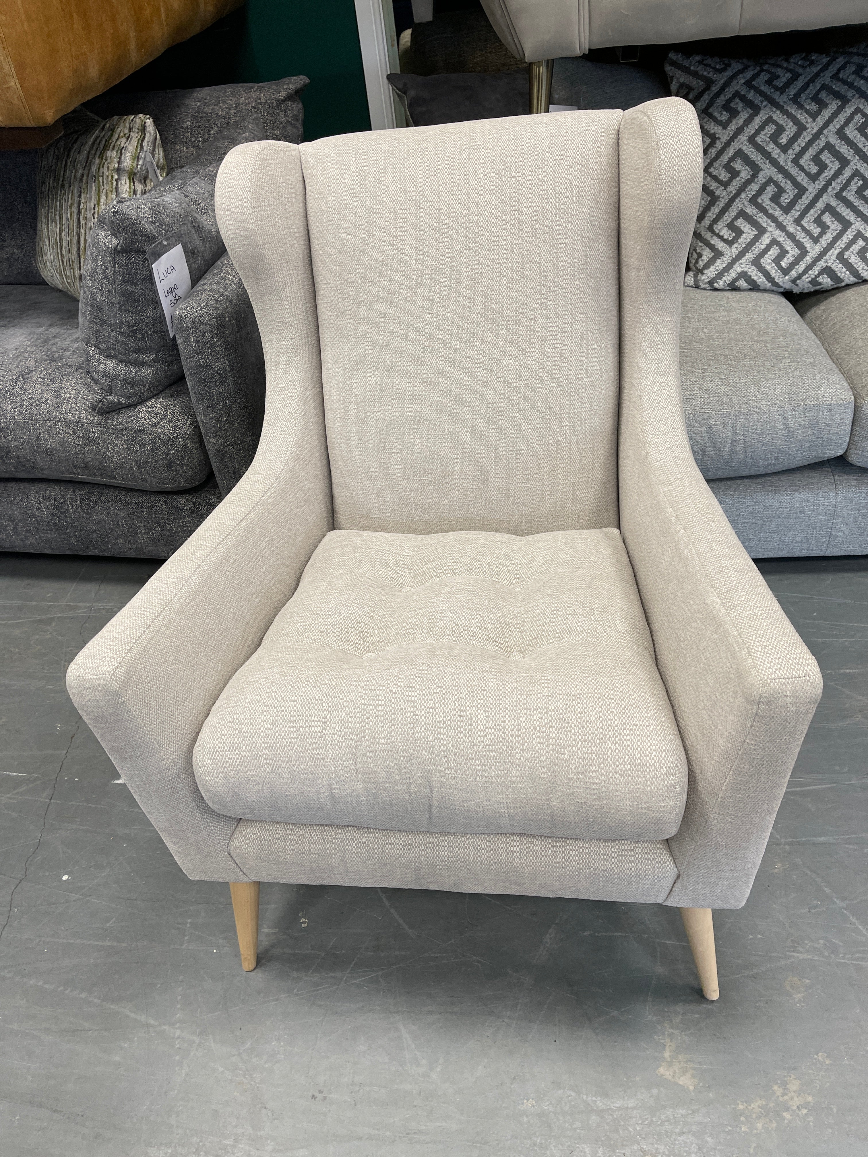 Grand Designs Padstow wingback armchair in light natural cross weave fabric